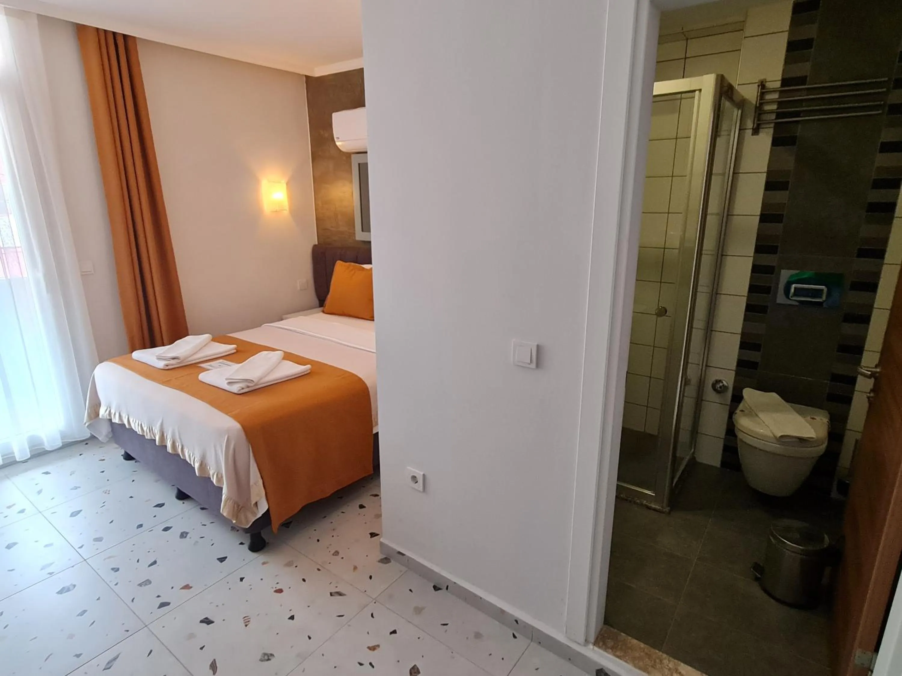 Bed in Tonoz Beach Hotel