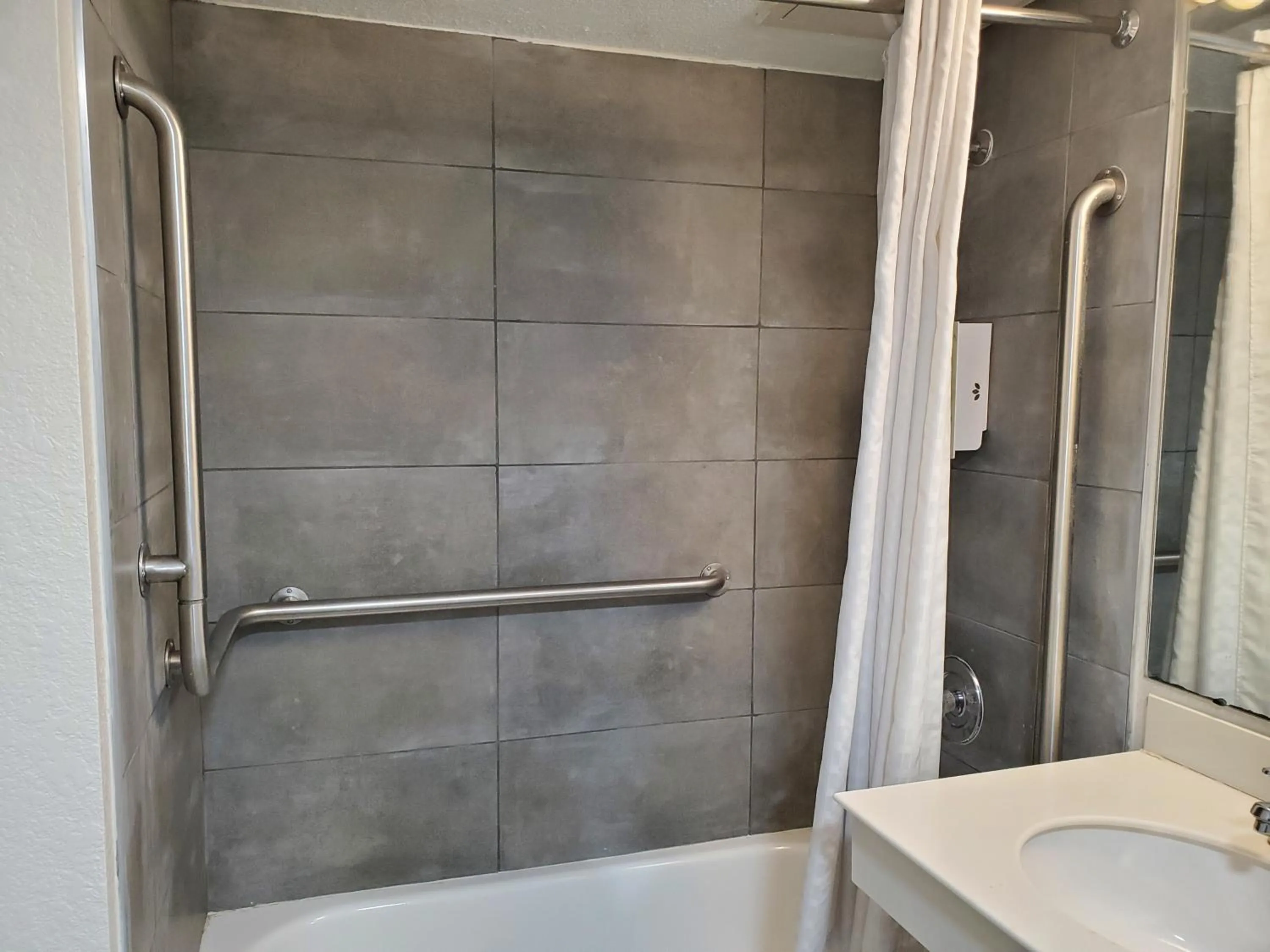 Shower in Budget Host Inn- Medical Center