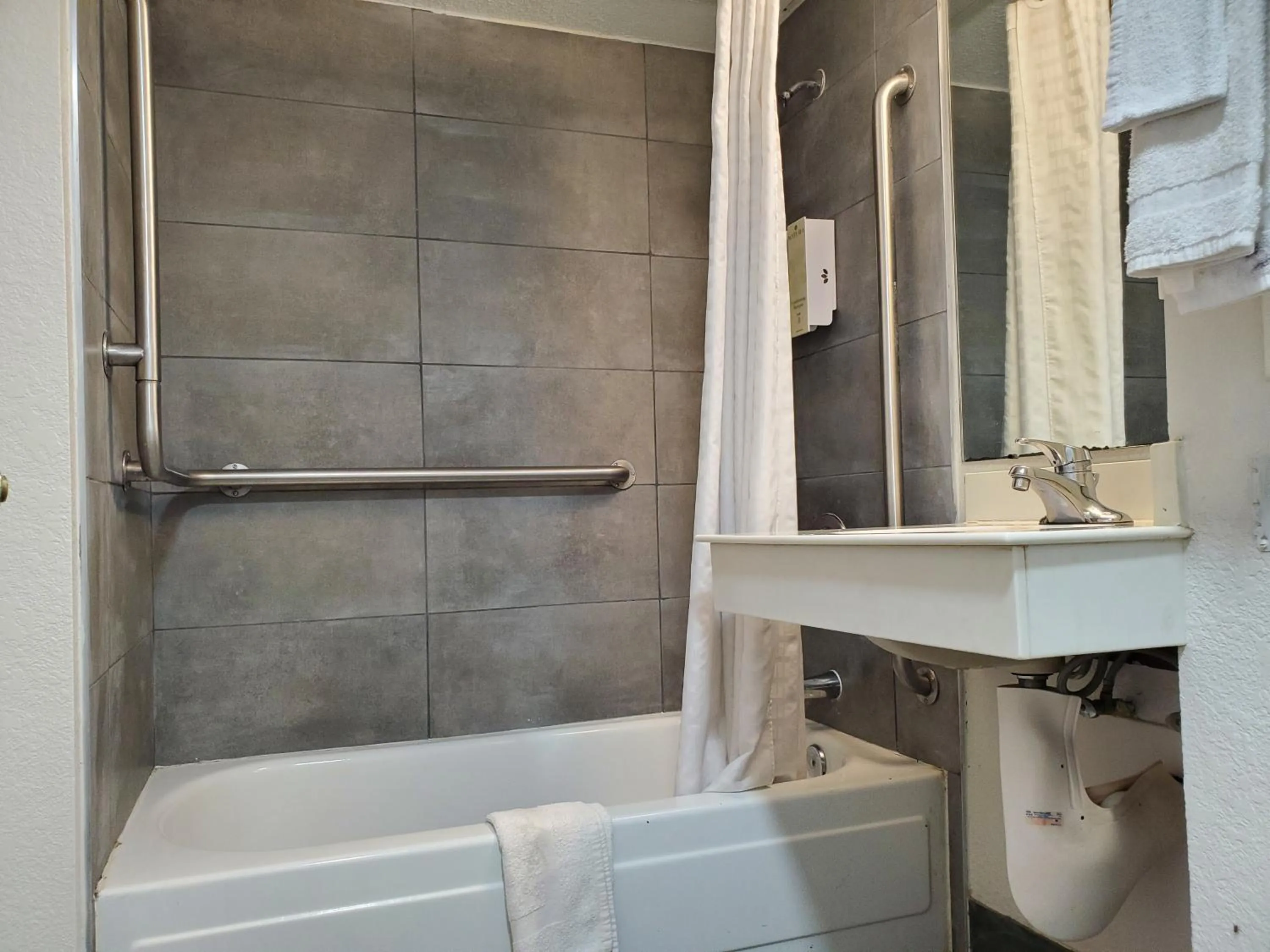 Shower in Budget Host Inn- Medical Center