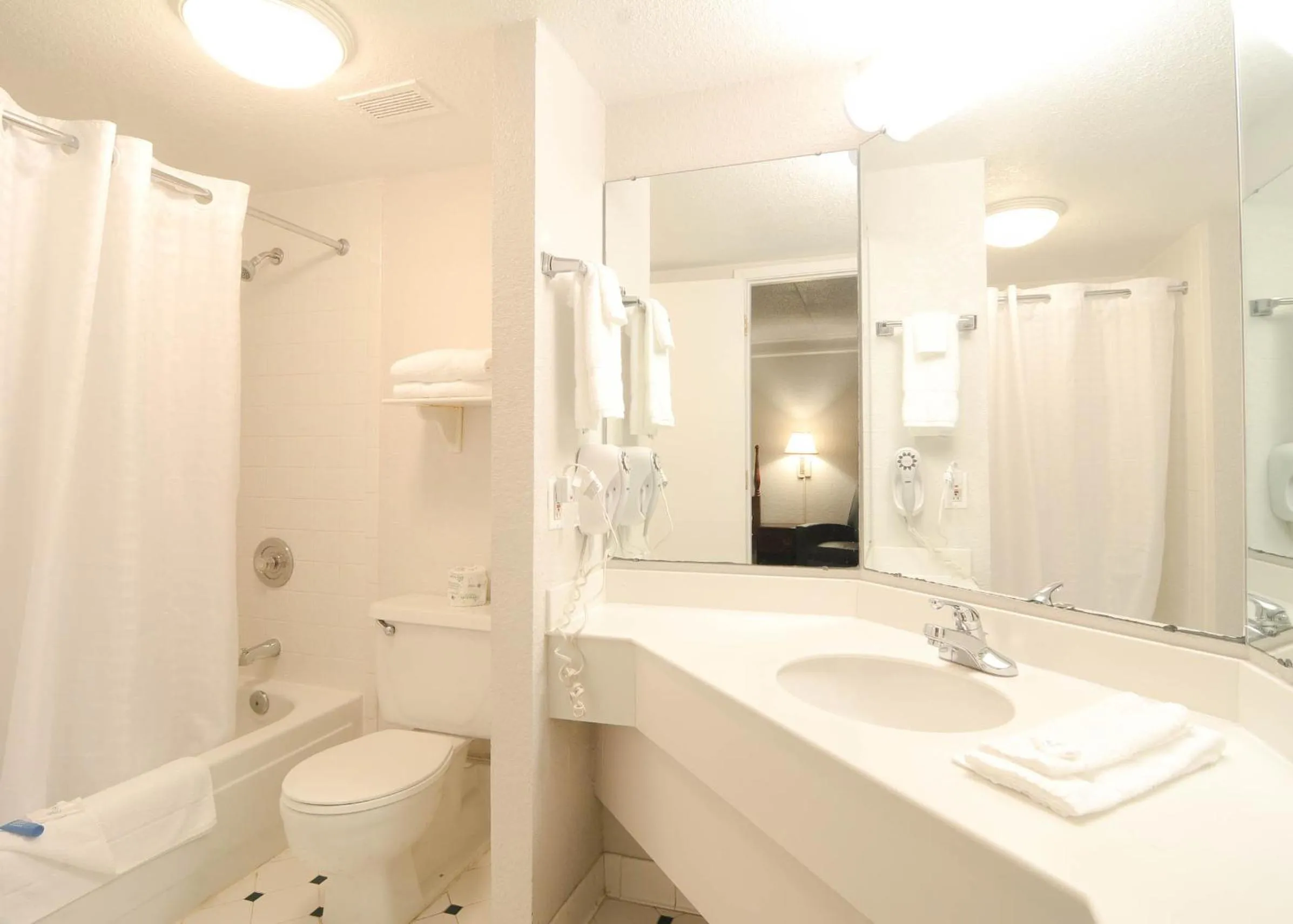 Shower in Budget Host Inn- Medical Center