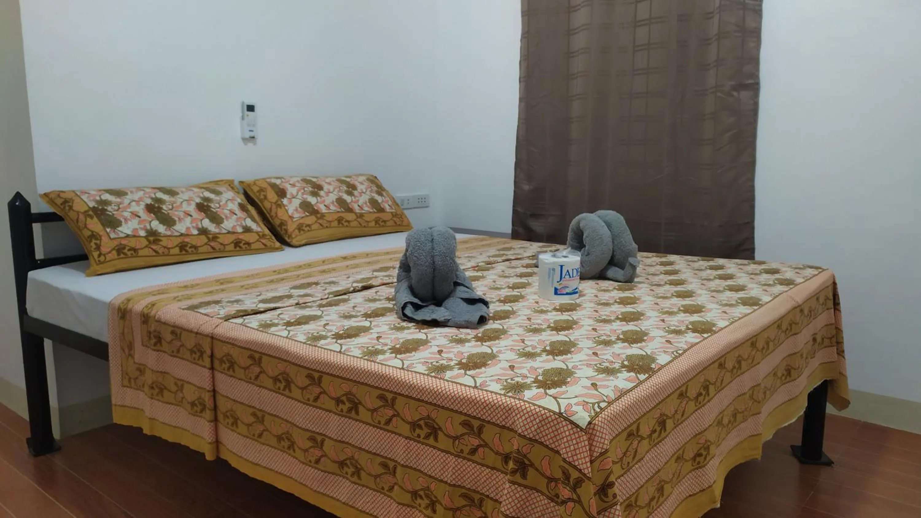 Bed in Hotel Ashoka (Authentic Indian Cuisine)