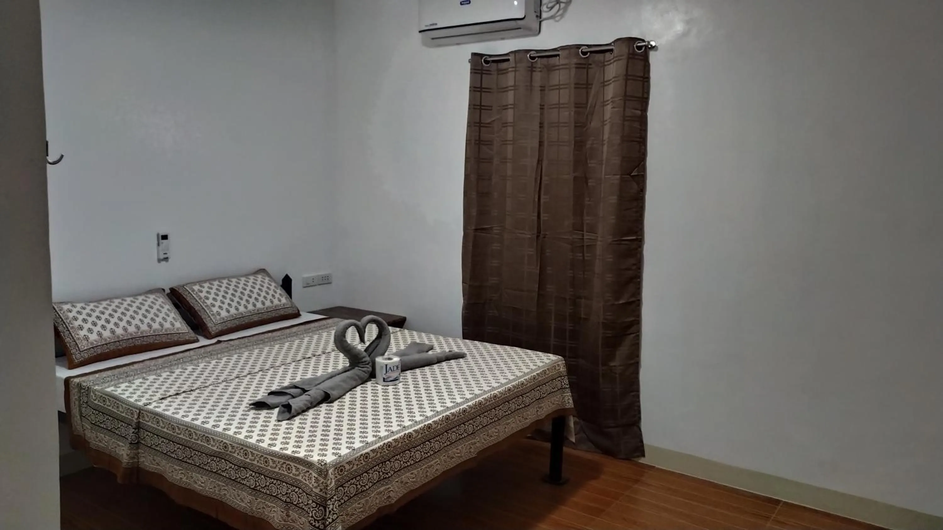 Bed in Hotel Ashoka (Authentic Indian Cuisine)