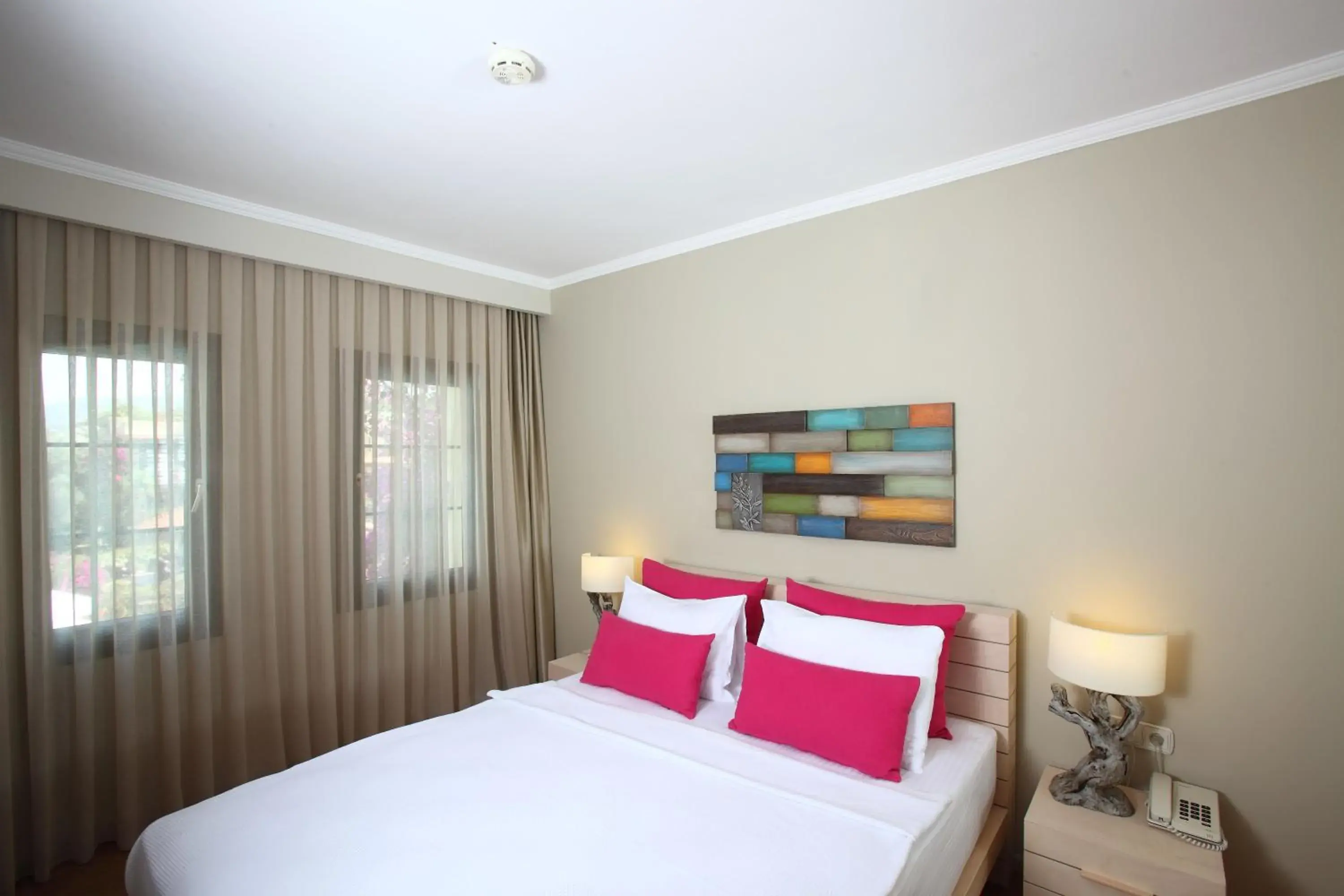 Bed in Zeytinada Hotel Bed in Zeytinada Hotel