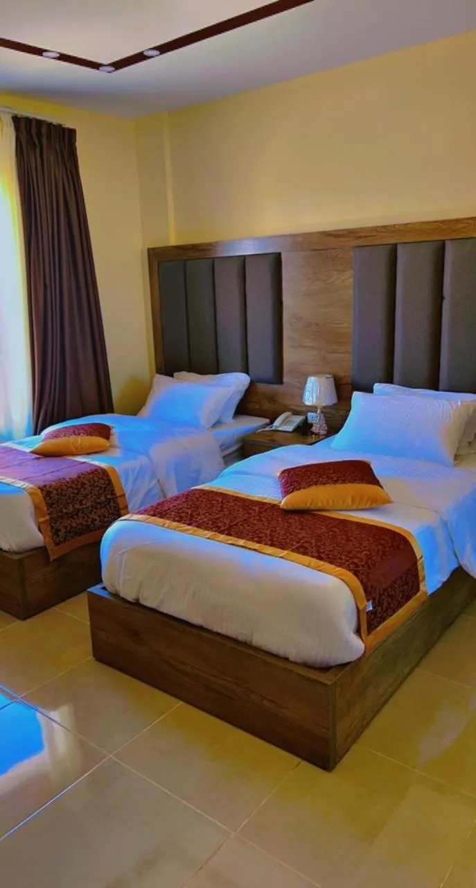 Bed in Shaqilath Hotel