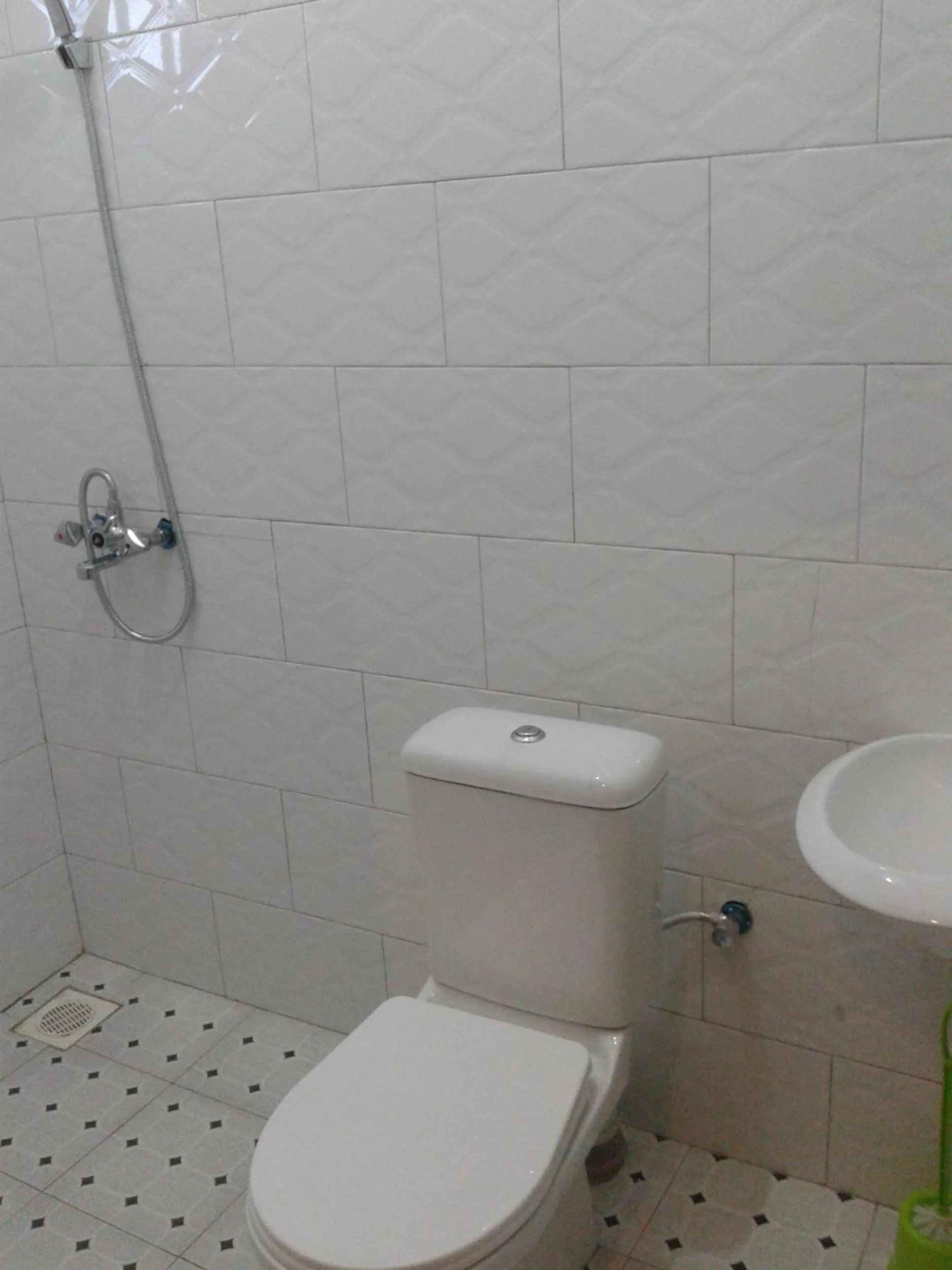 Toilet in FREEDOM Guest House