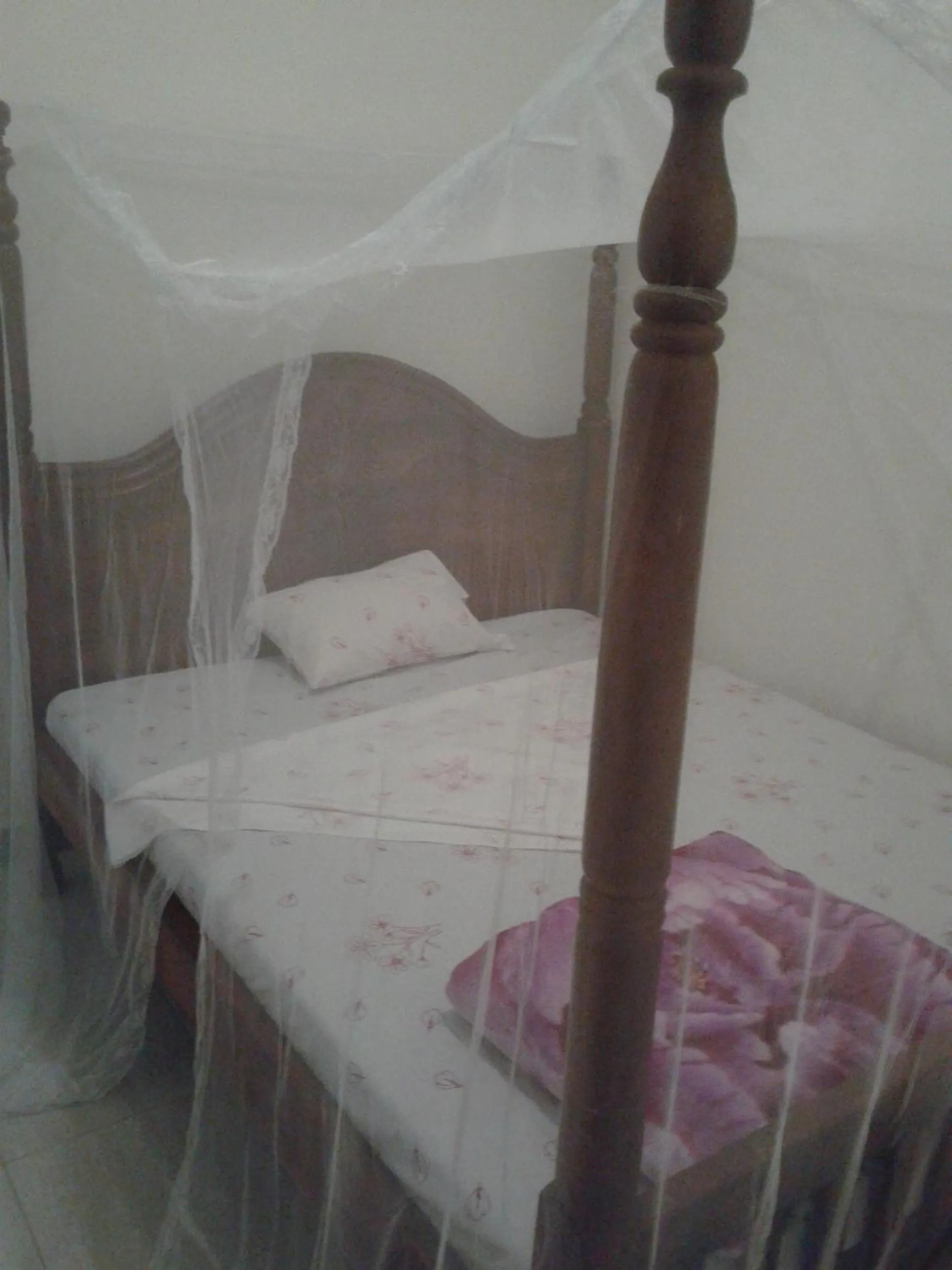 Bed in FREEDOM Guest House