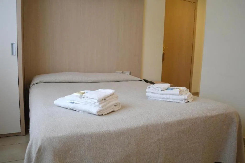 Bed in La Lanterna Hotel