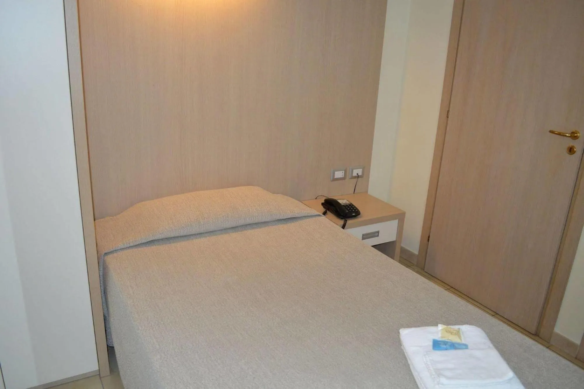 Bed in La Lanterna Hotel