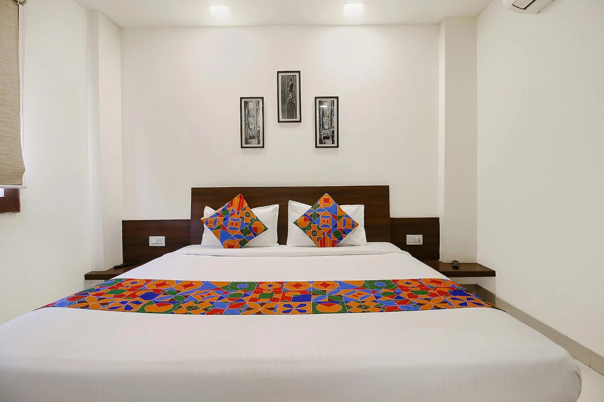 Bed in FabExpress Comfort Stay I