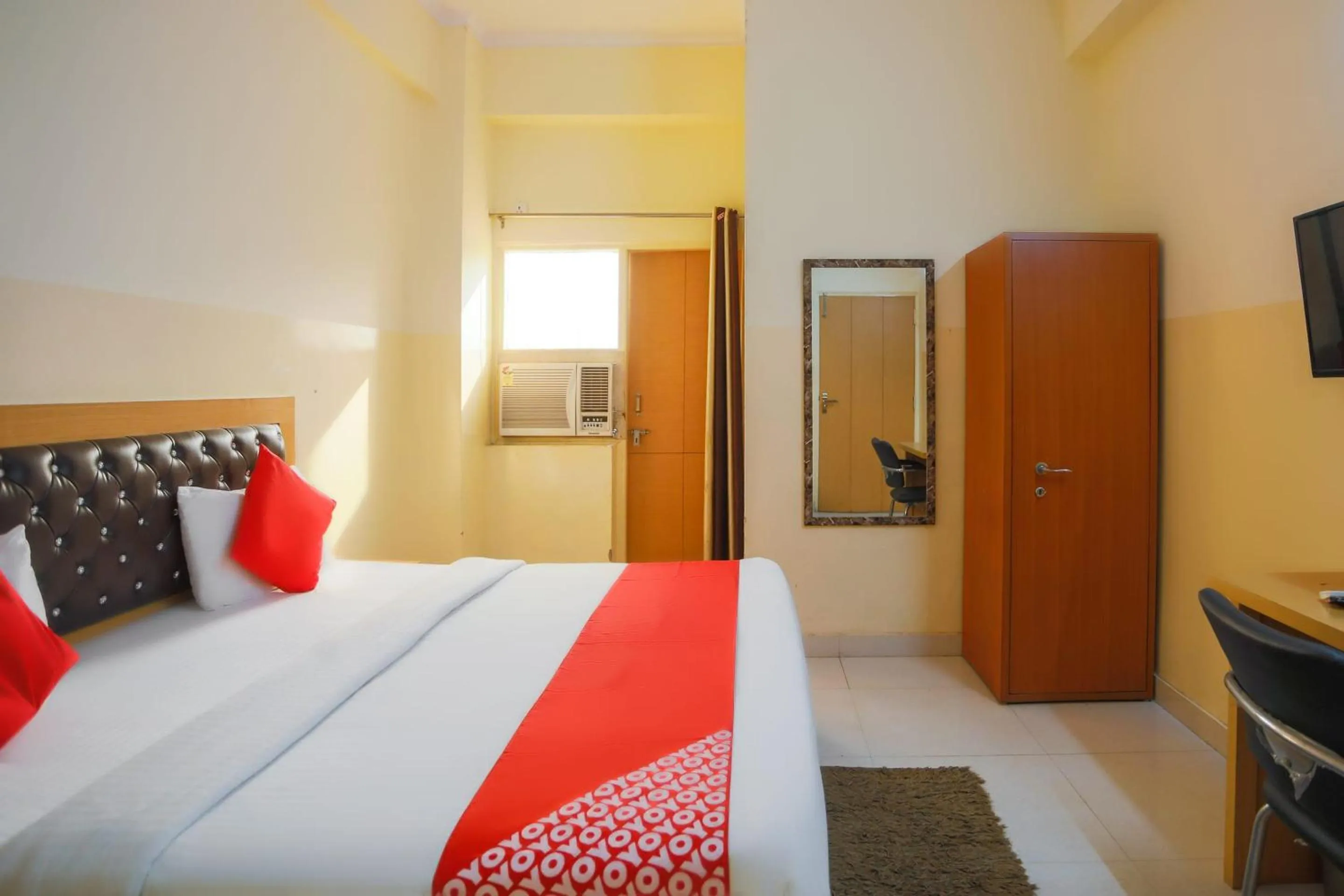 Bedroom in Capital O Crosswind Gold