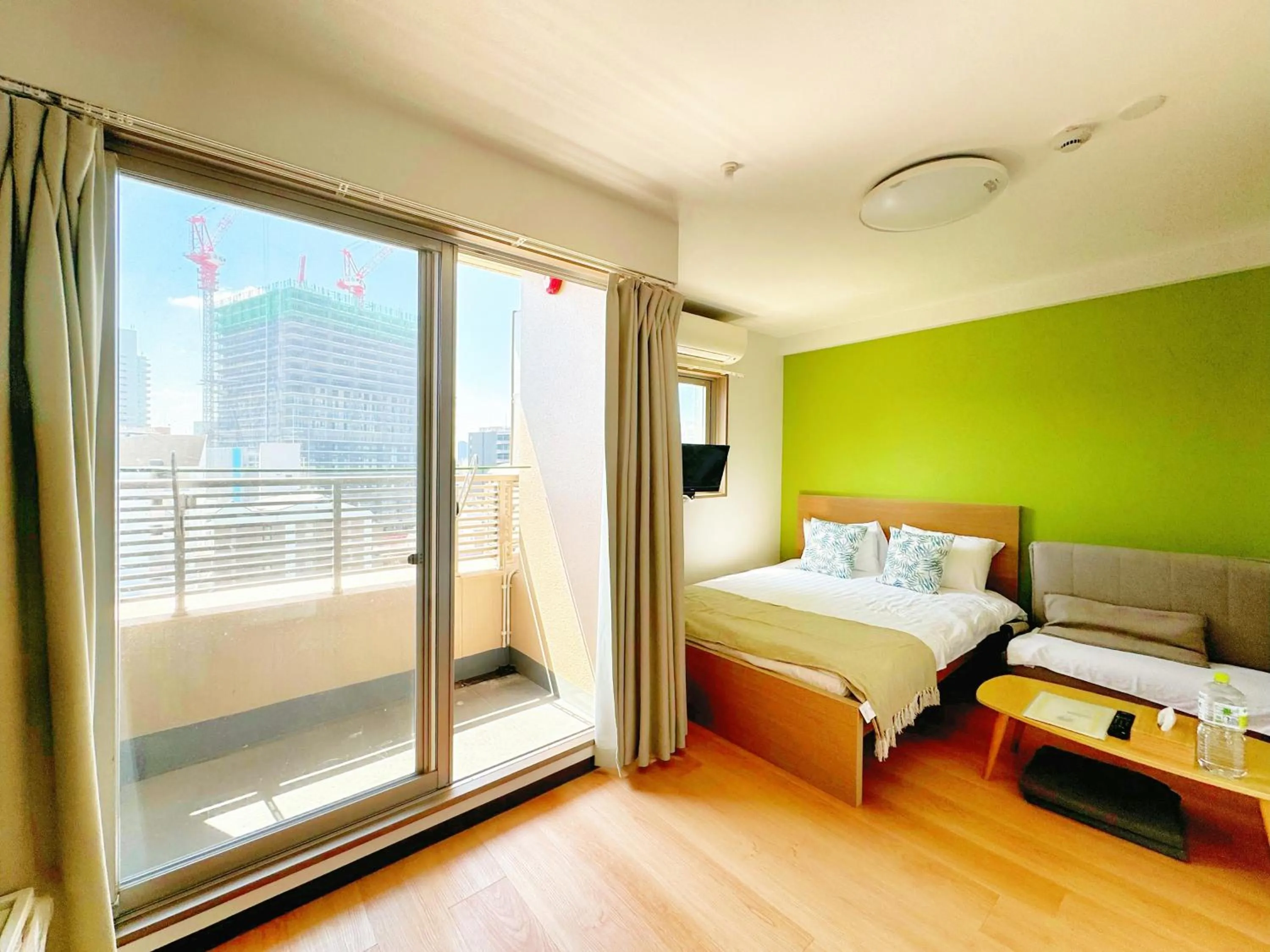 Bed in Juso AFP Apartment Hotel