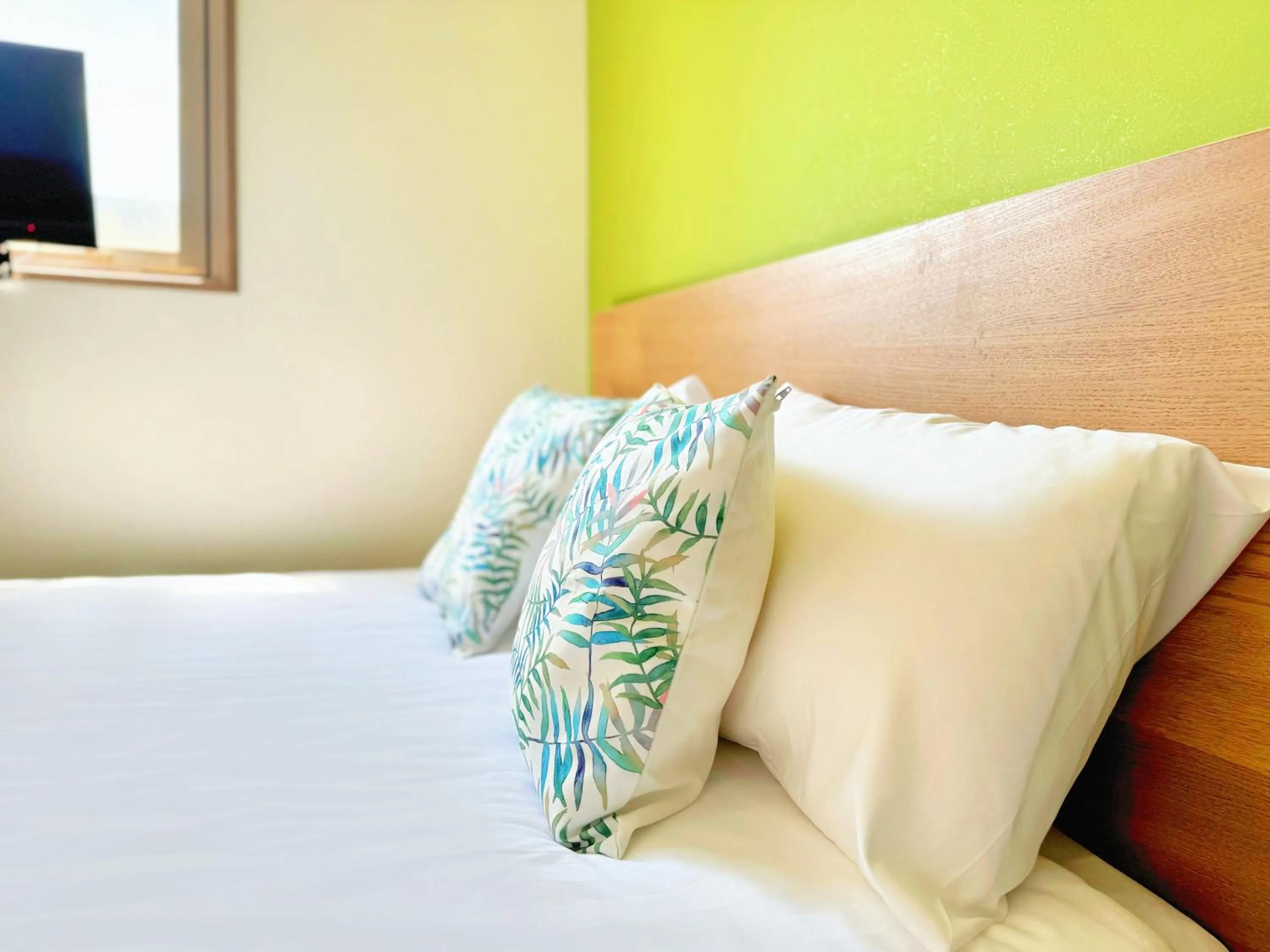 Bed in Juso AFP Apartment Hotel