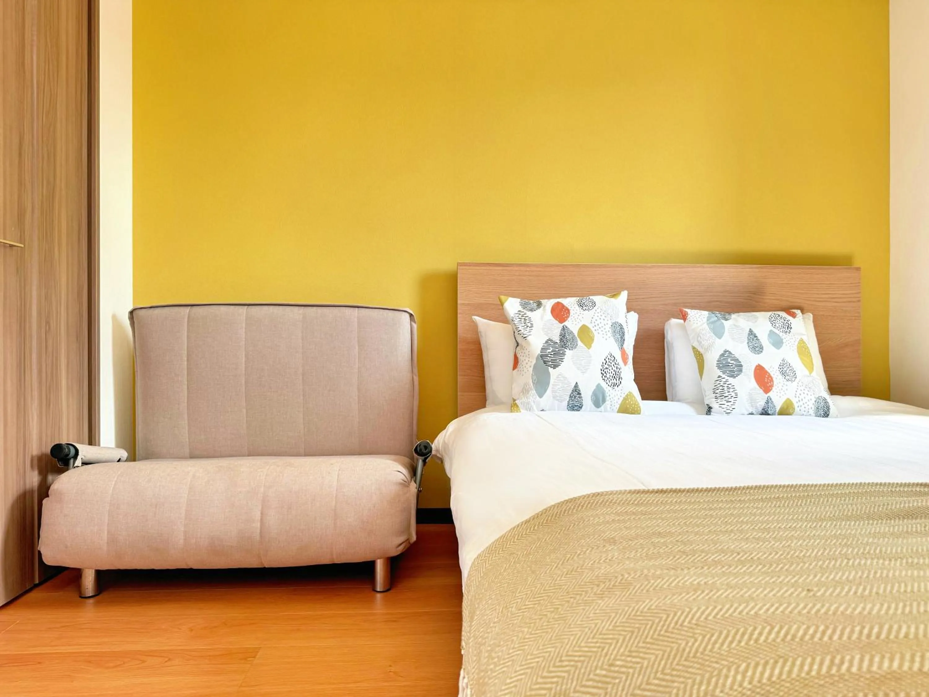 Bed in Juso AFP Apartment Hotel