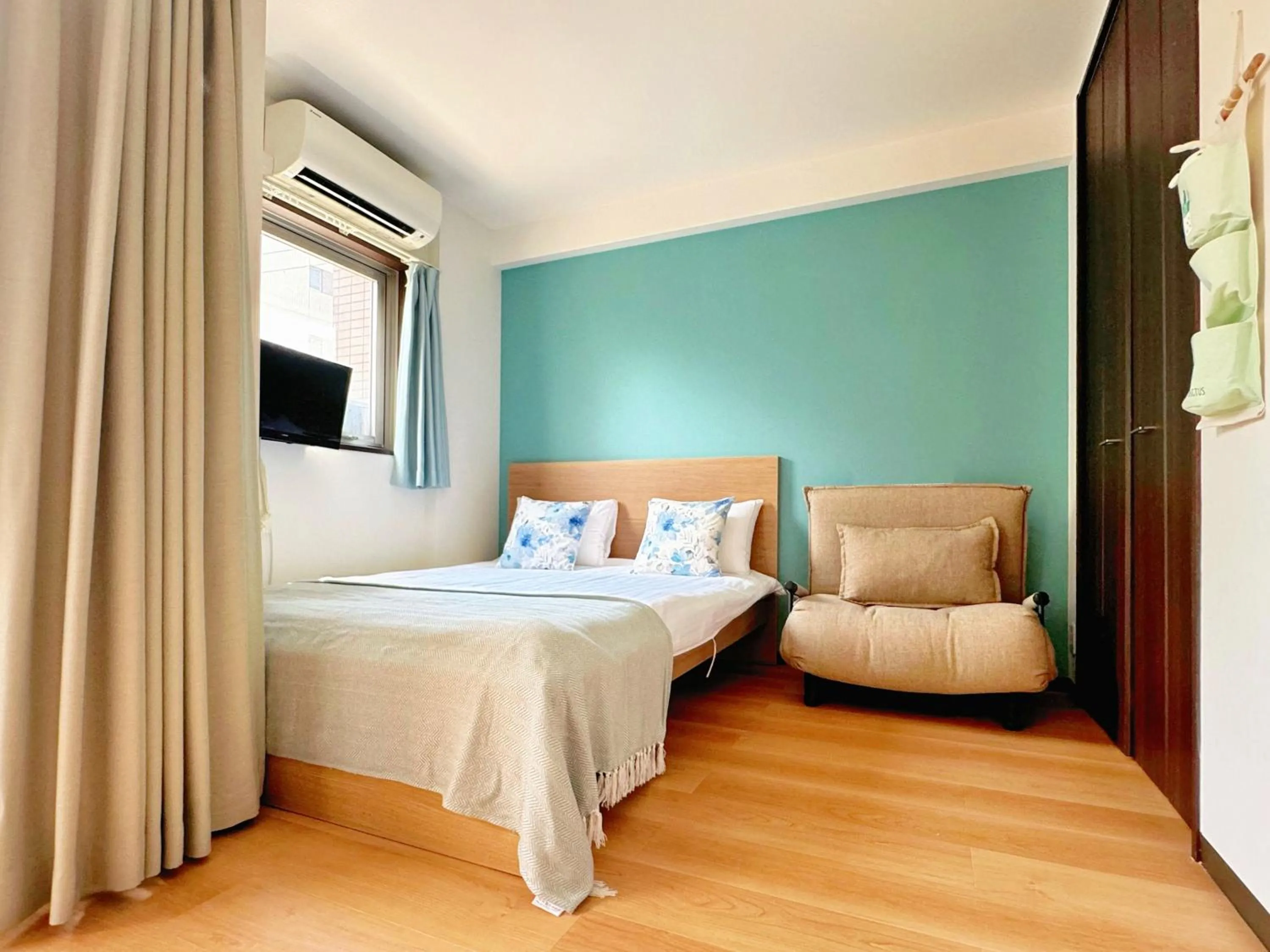 Bed in Juso AFP Apartment Hotel