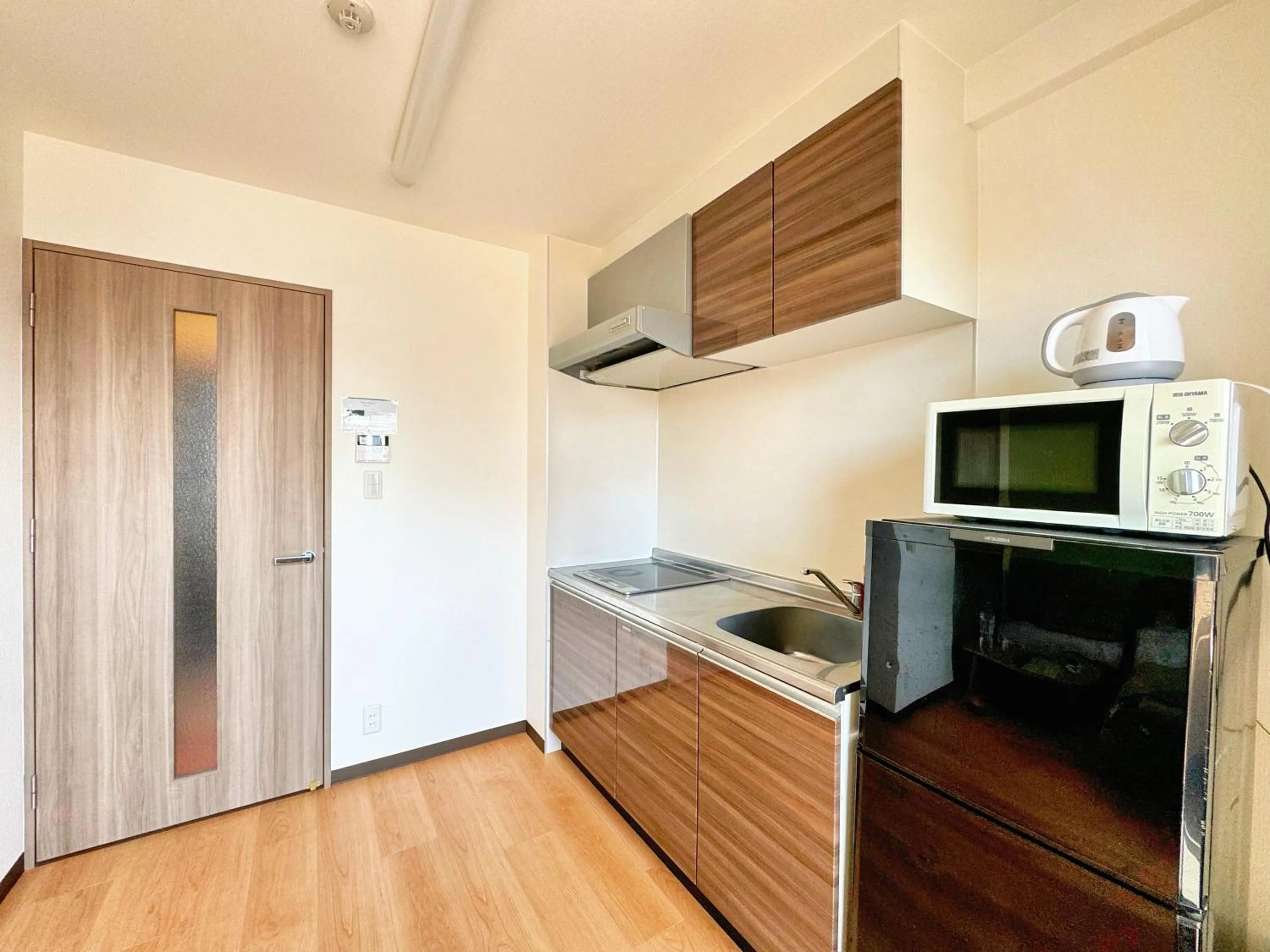 Kitchen or kitchenette in Juso AFP Apartment Hotel