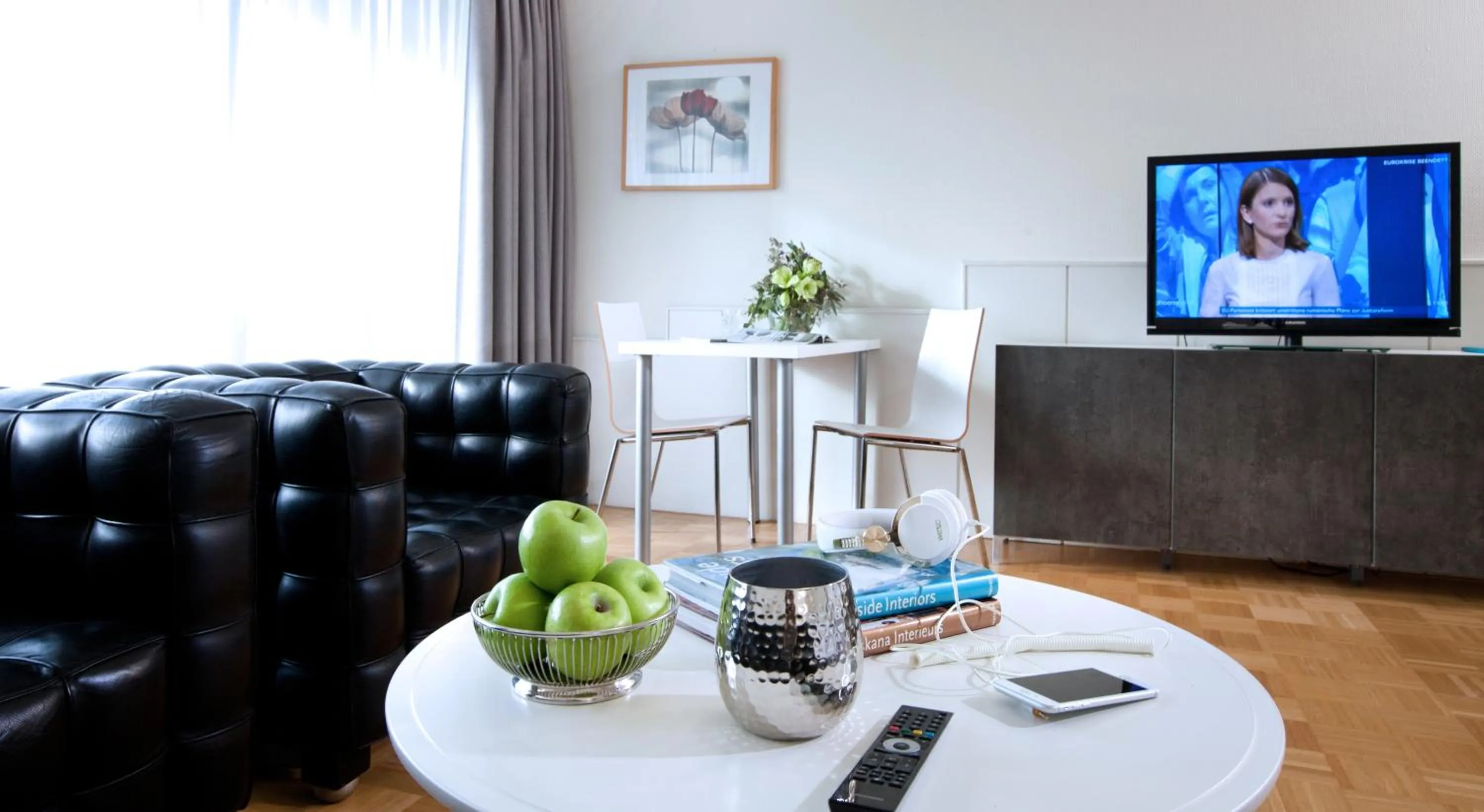 Living room in Rheinhof by Gerda Good Living - Digital Access