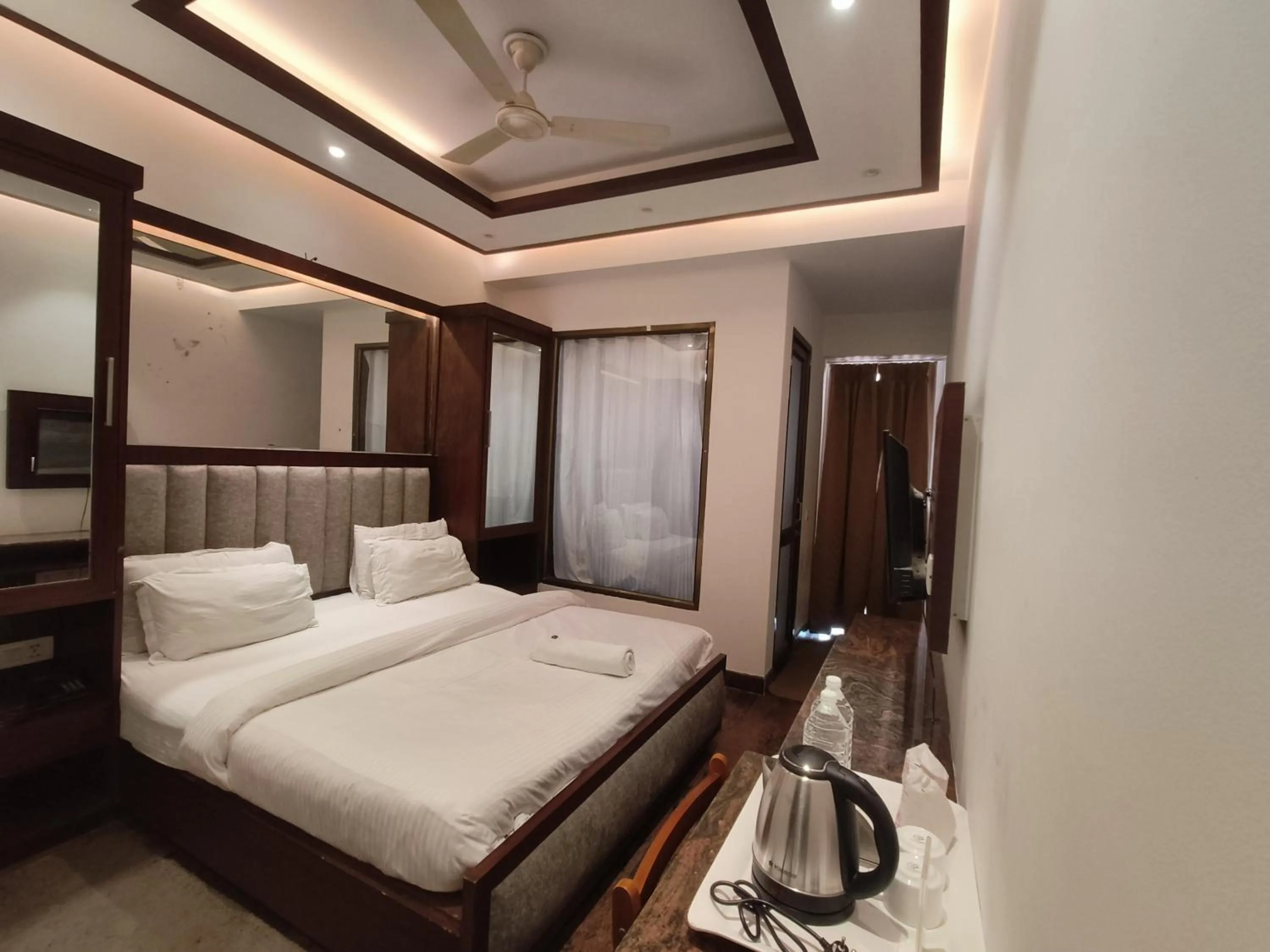 Bed in JJK Rukmini Vilas Hotel & Banquet