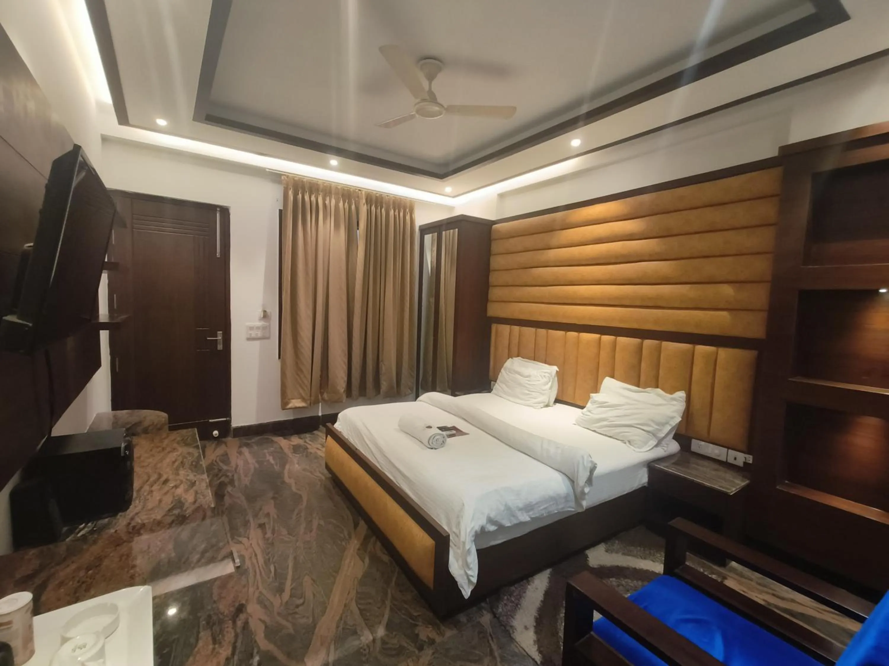 Bed in JJK Rukmini Vilas Hotel & Banquet
