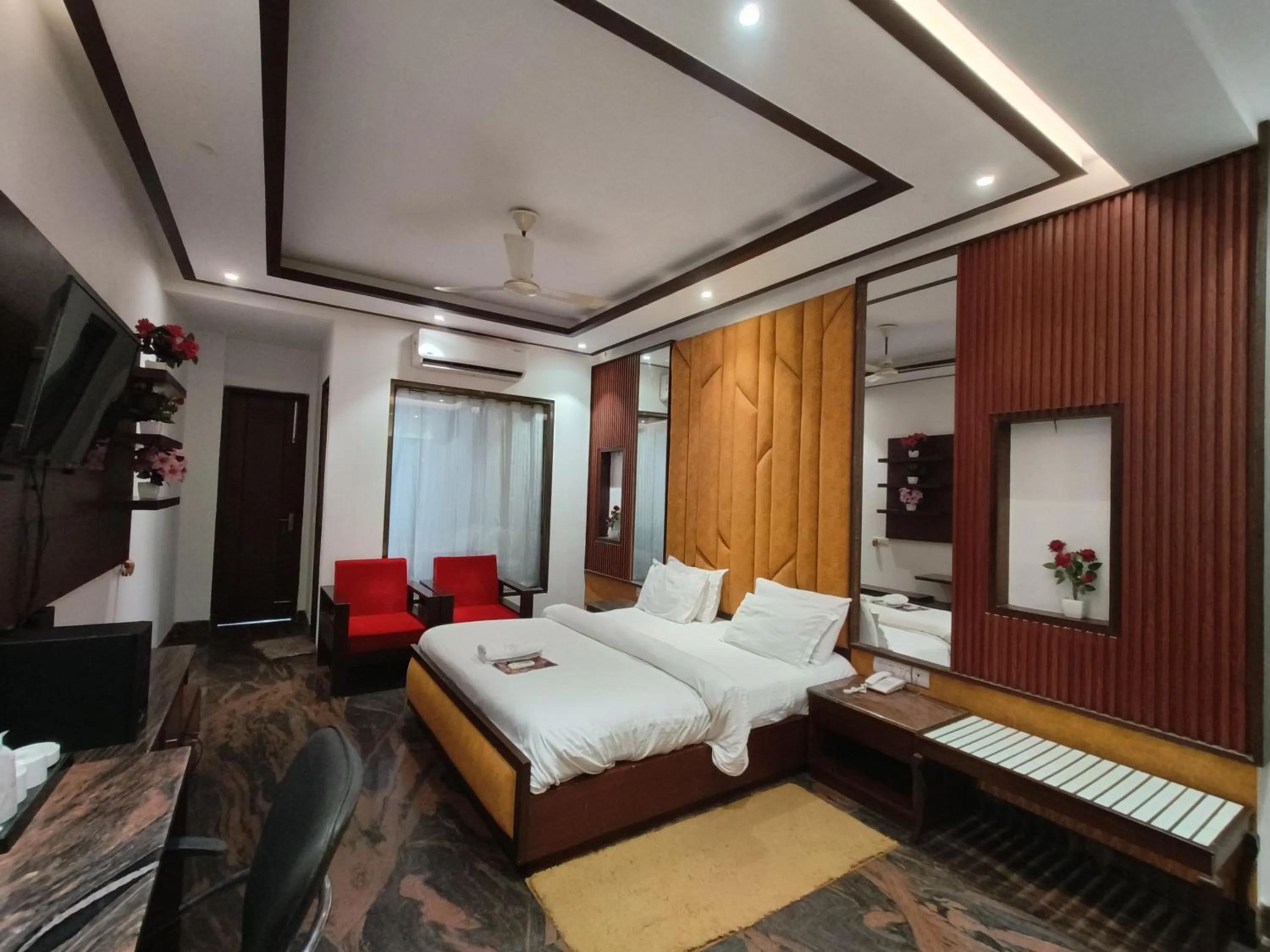 Bed in JJK Rukmini Vilas Hotel & Banquet