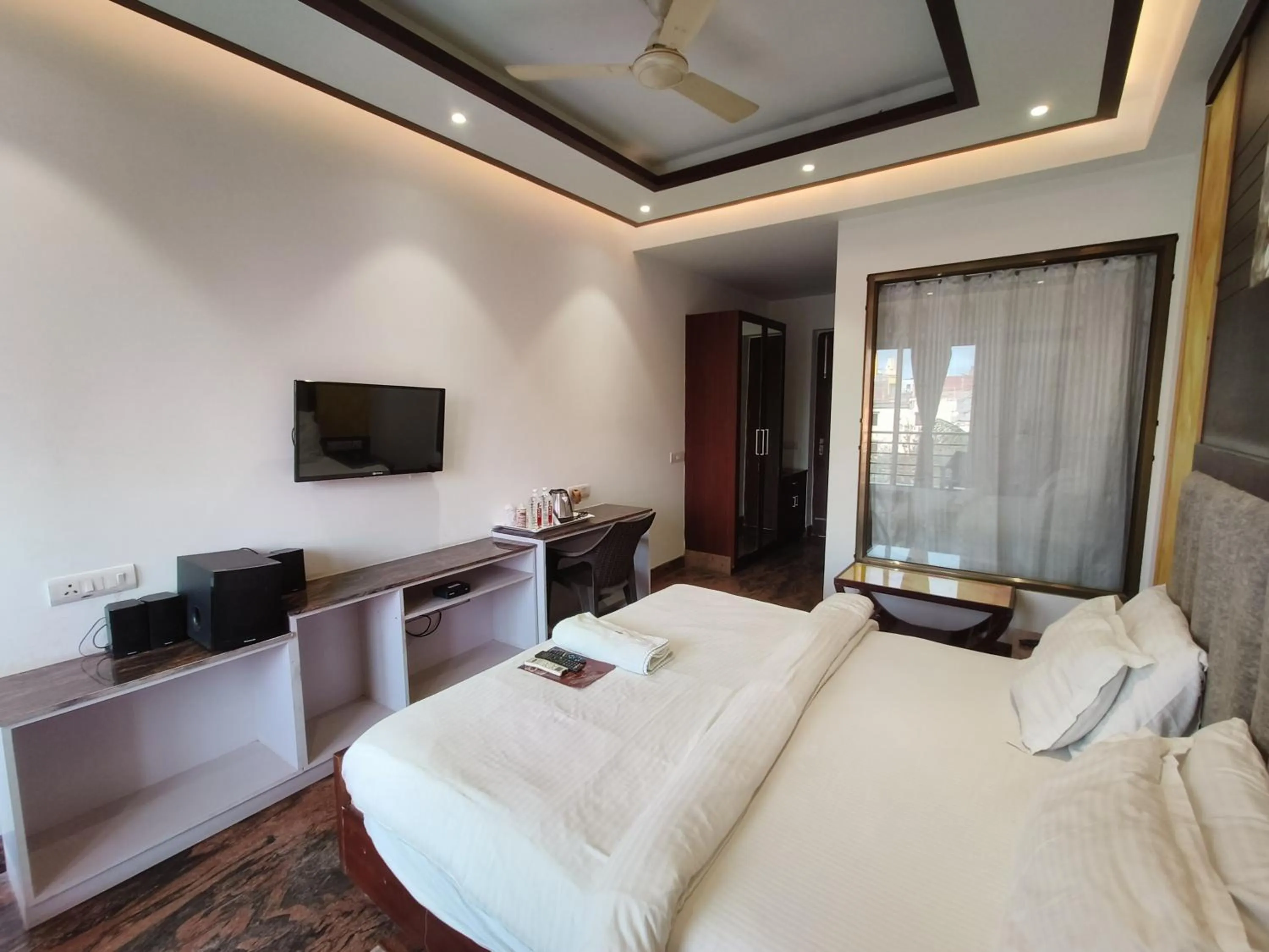 Bed in JJK Rukmini Vilas Hotel & Banquet