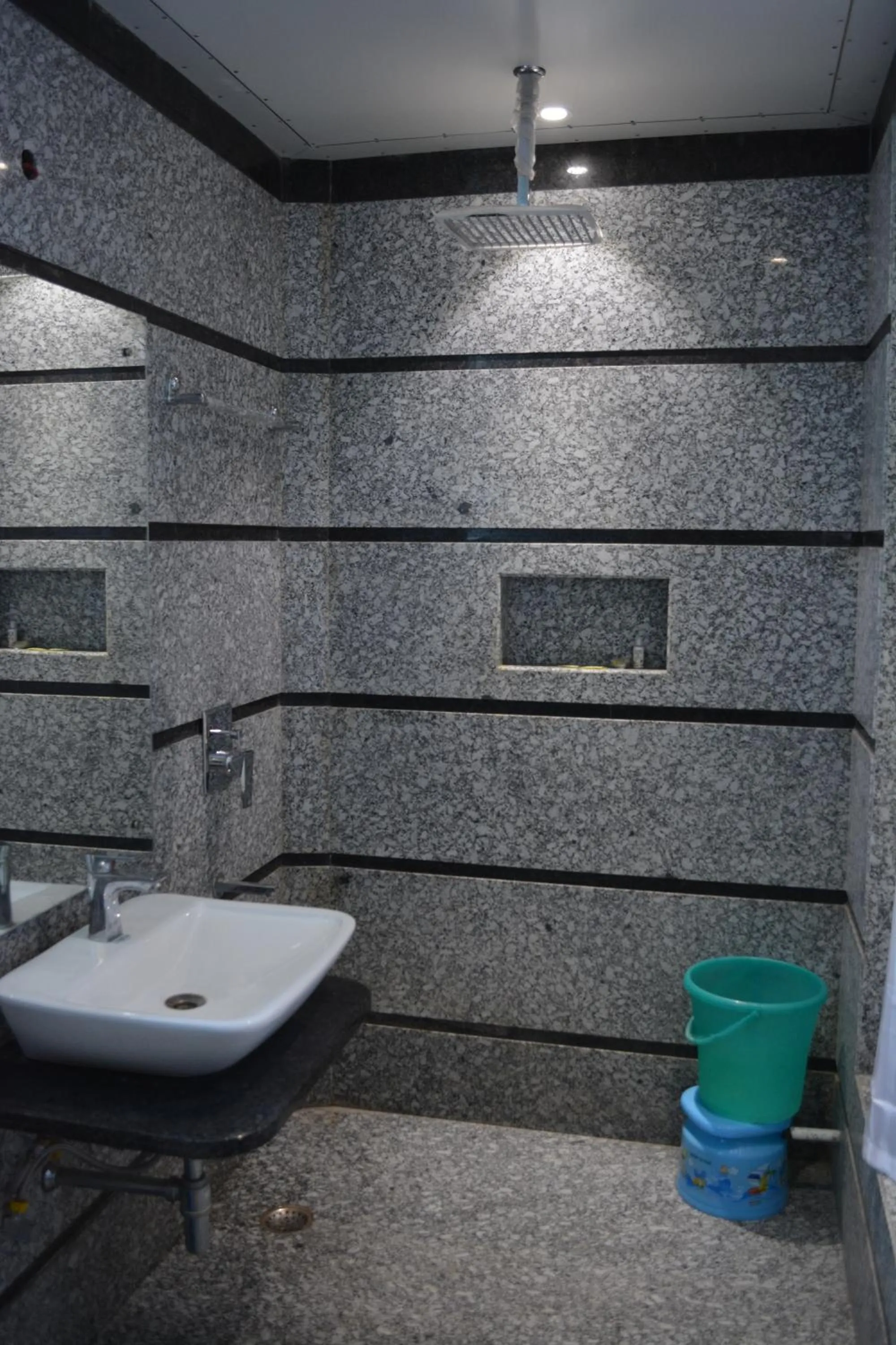 Bathroom in JJK Rukmini Vilas Hotel & Banquet