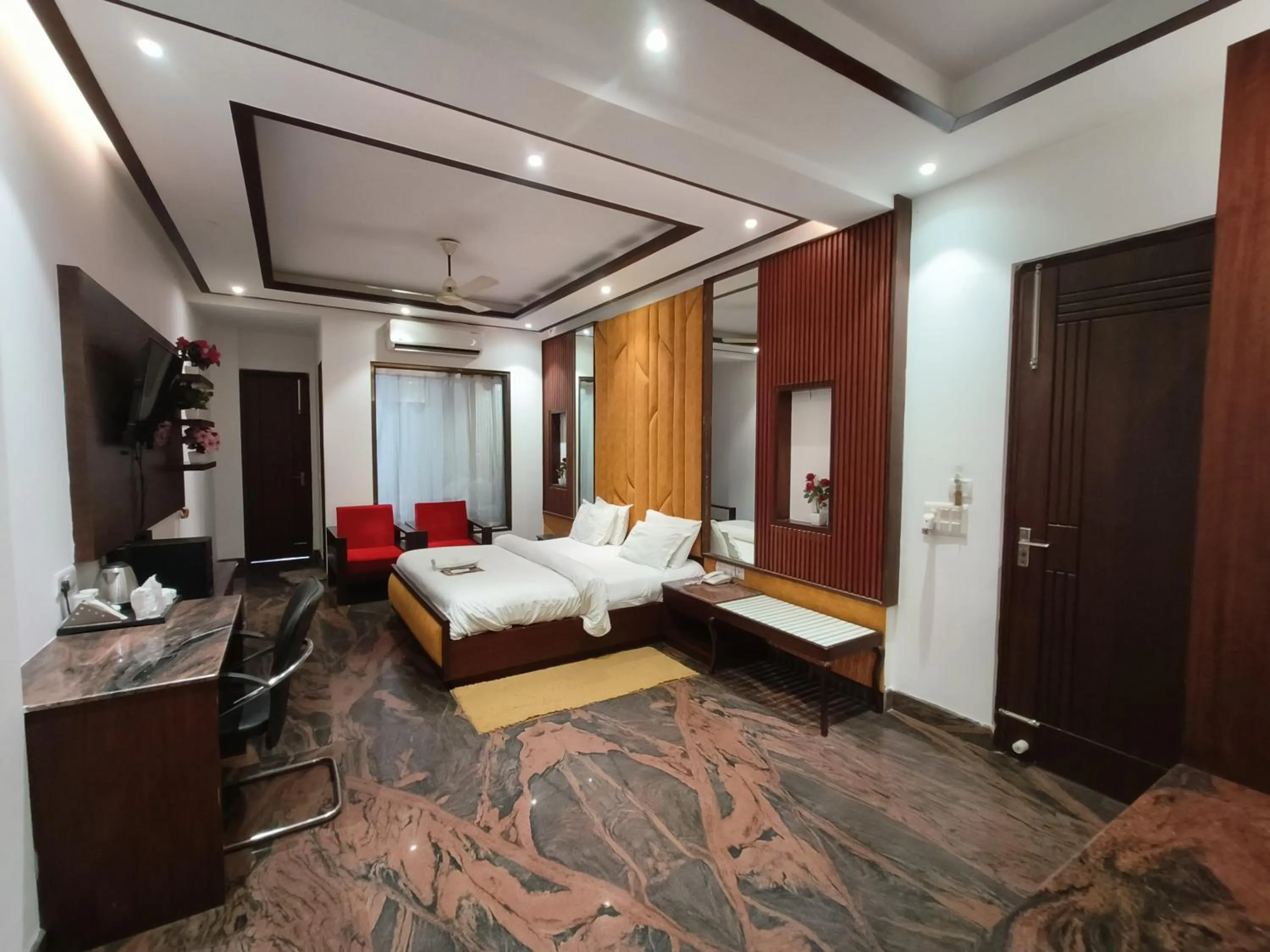 Bed in JJK Rukmini Vilas Hotel & Banquet