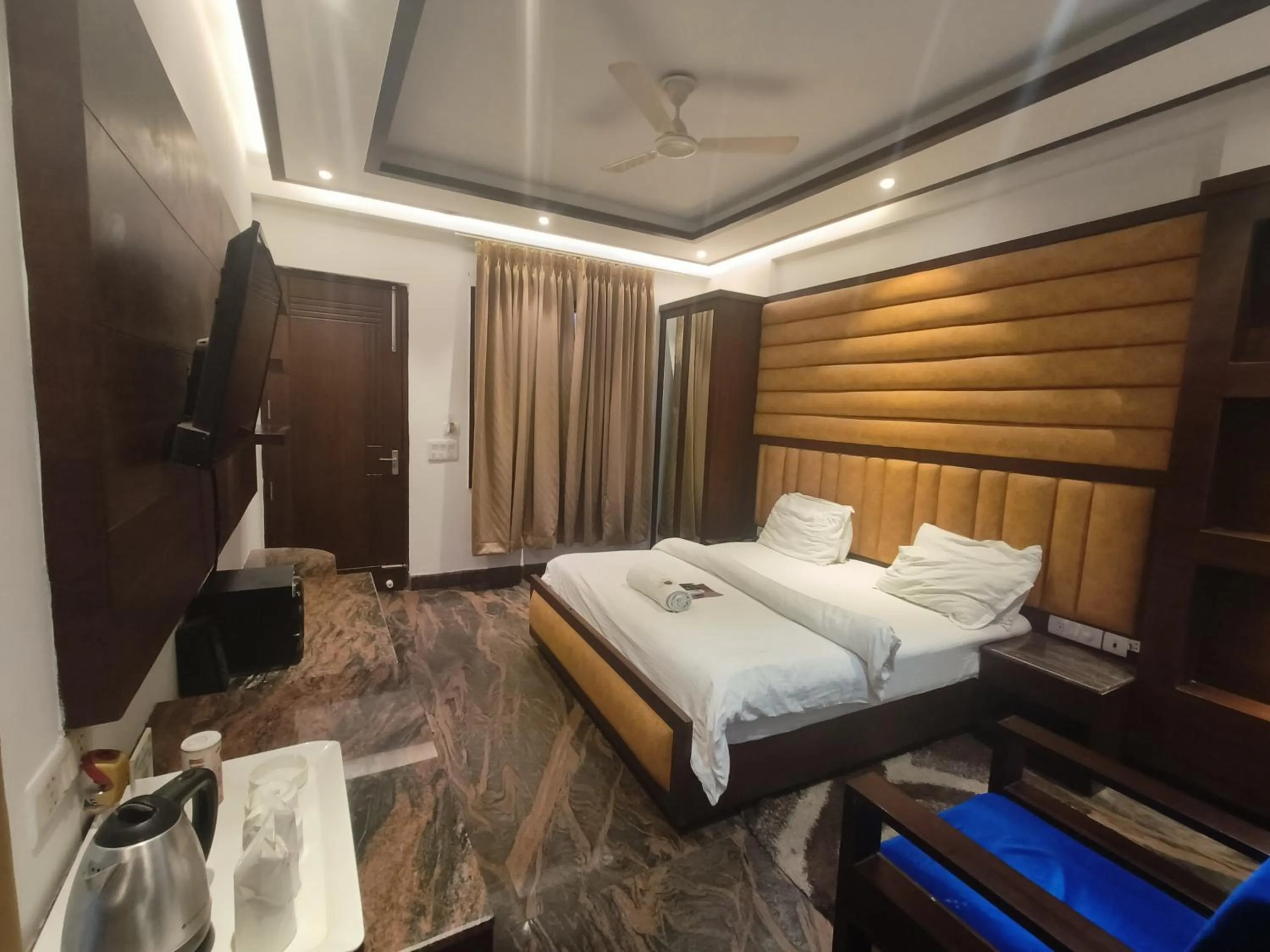 Bed in JJK Rukmini Vilas Hotel & Banquet