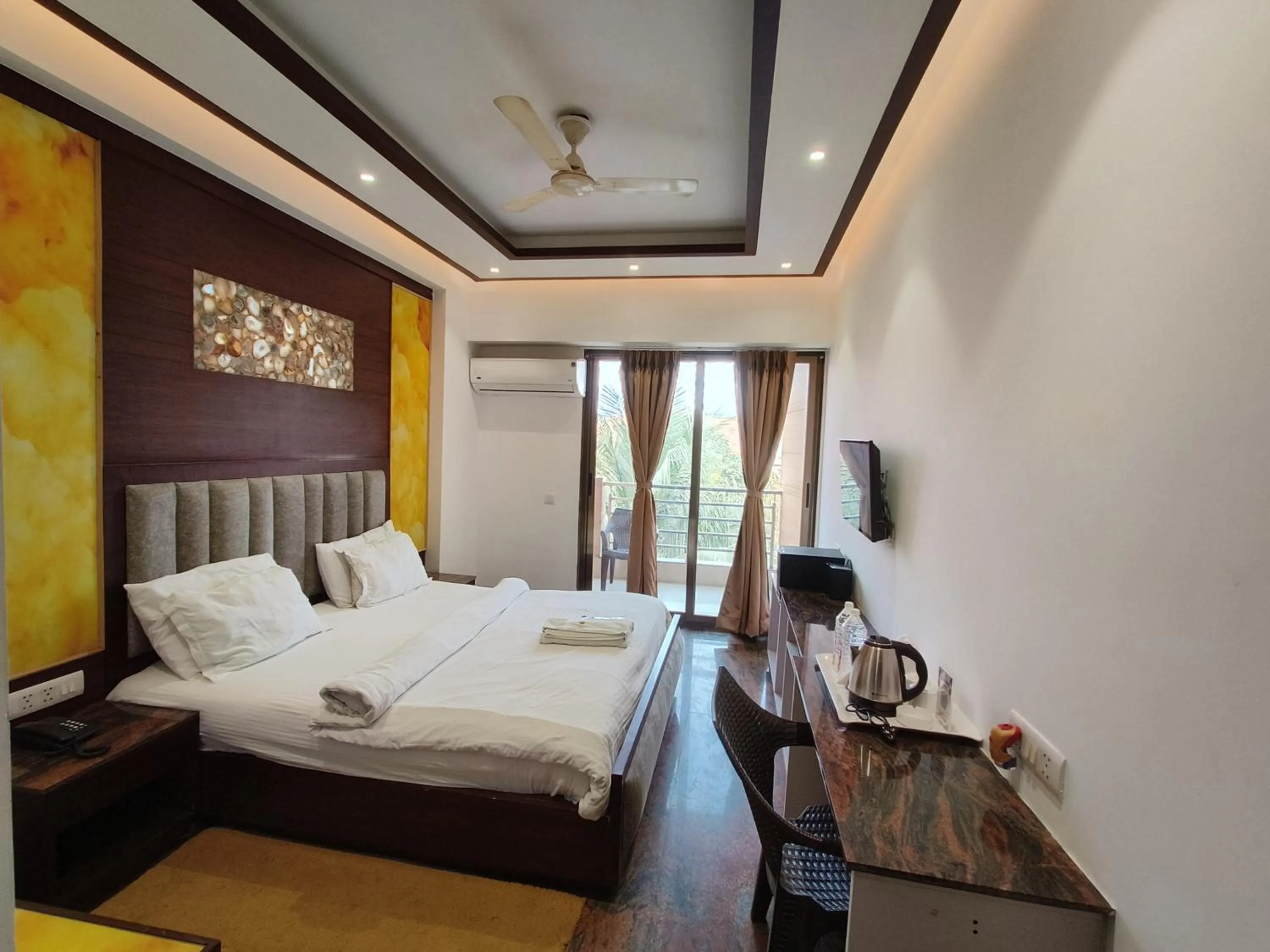 Bed in JJK Rukmini Vilas Hotel & Banquet