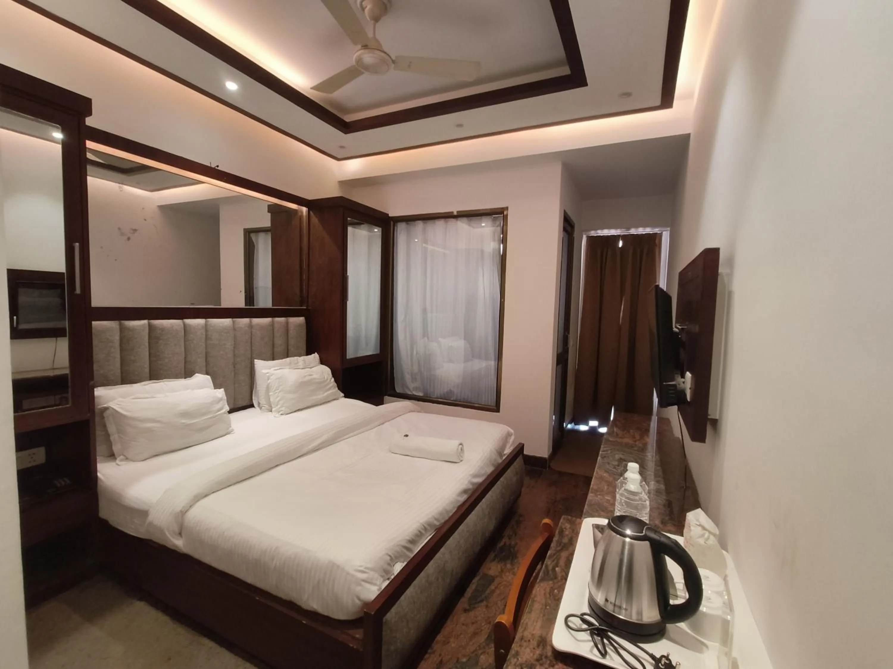 Bed in JJK Rukmini Vilas Hotel & Banquet
