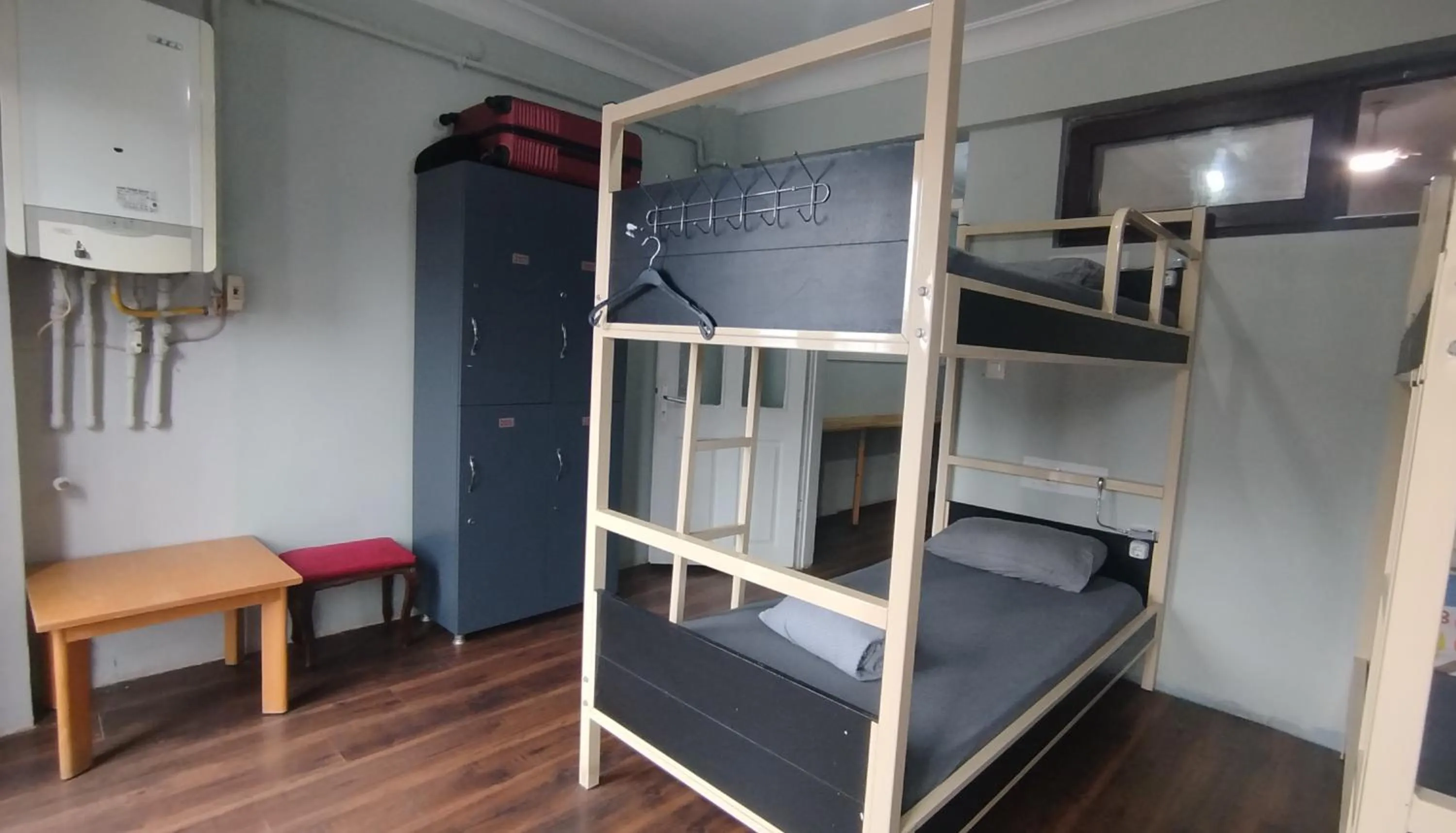 Seating area, Bed in ivy hostel cafe