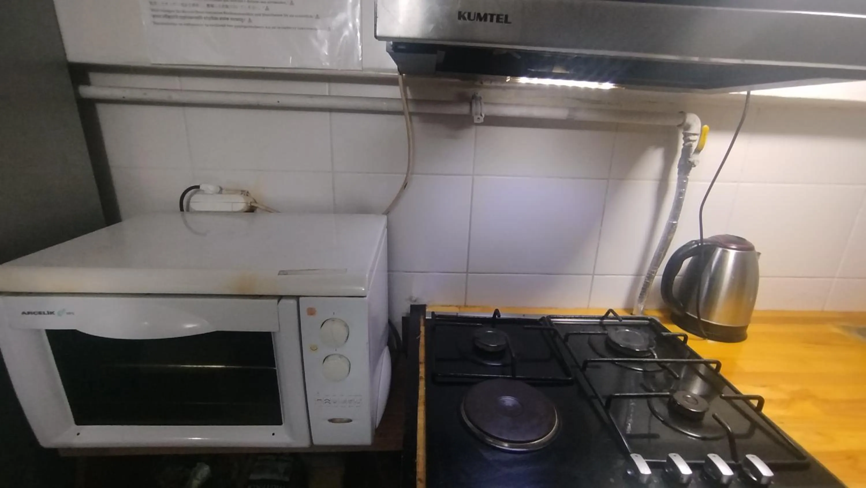 Communal kitchen in ivy hostel cafe