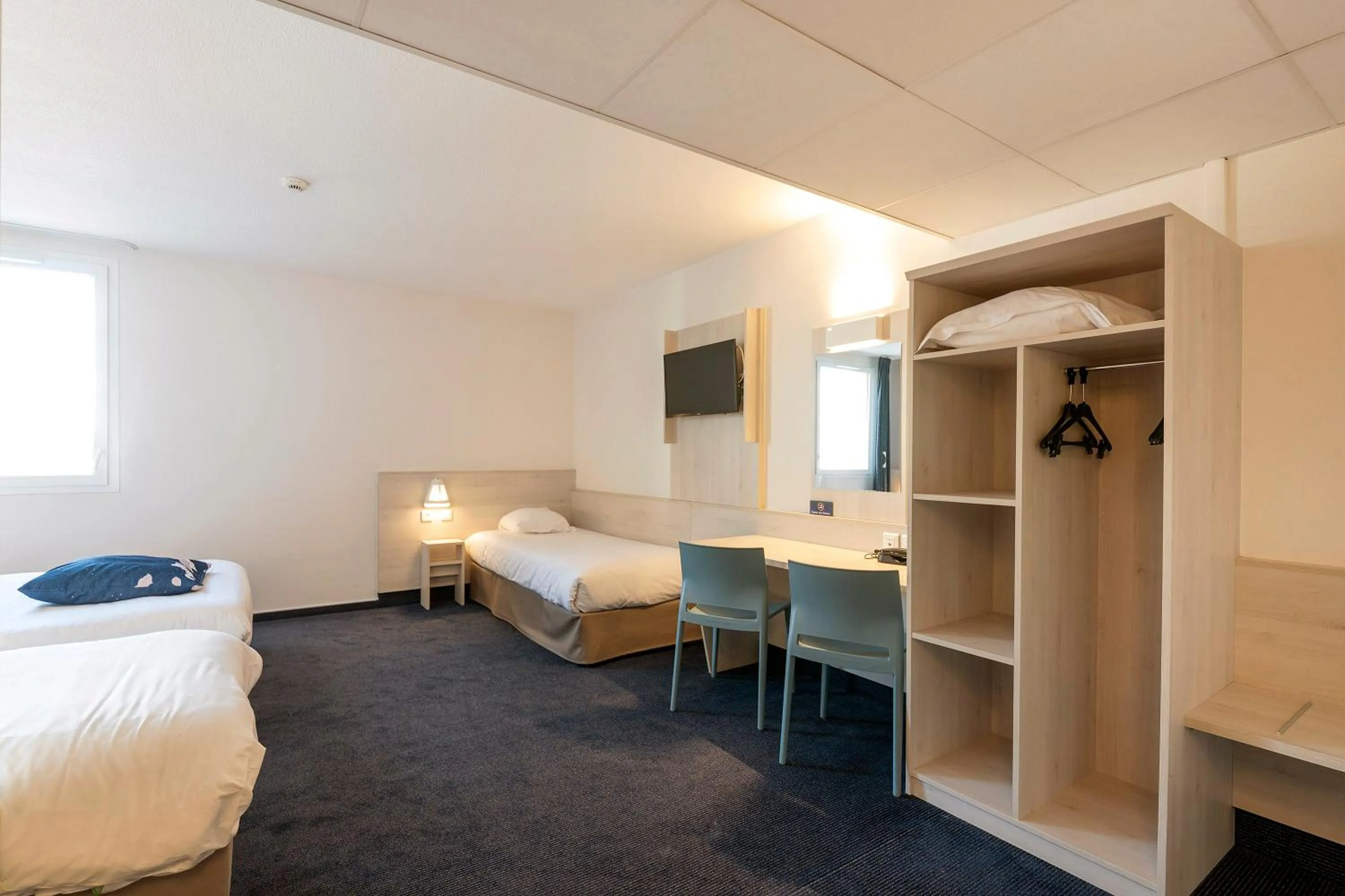 Bed in Ace Hôtel Paris Sud Villabe