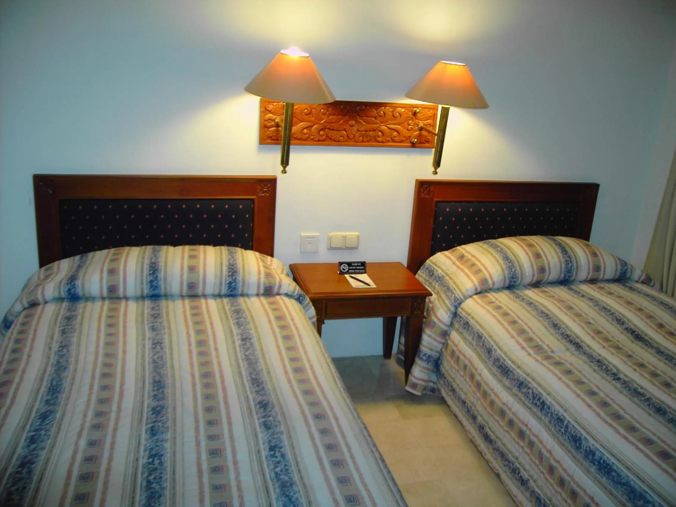 Bed in Resor Tuban Tropis