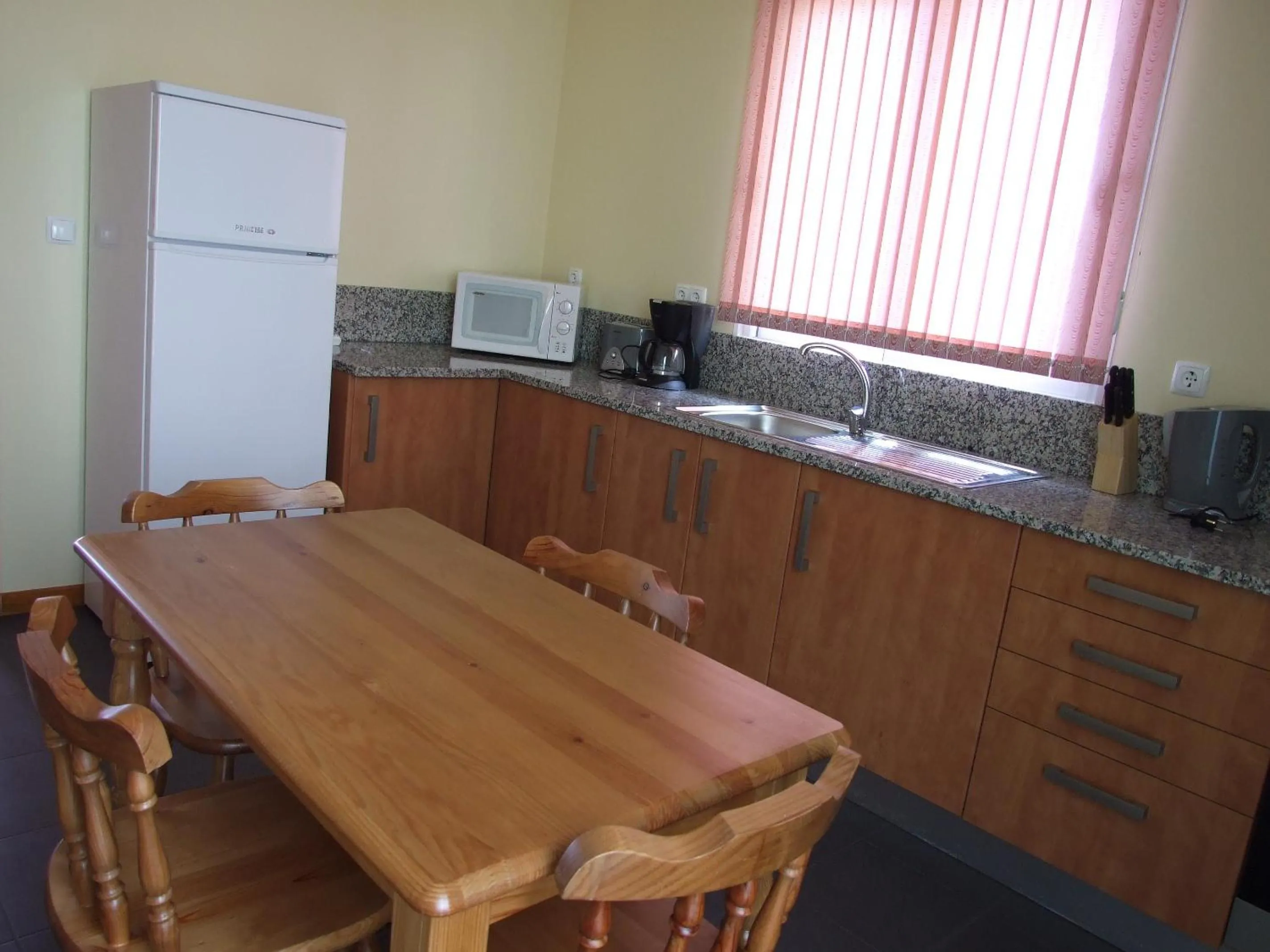 Kitchen or kitchenette in Paraiso das Flores