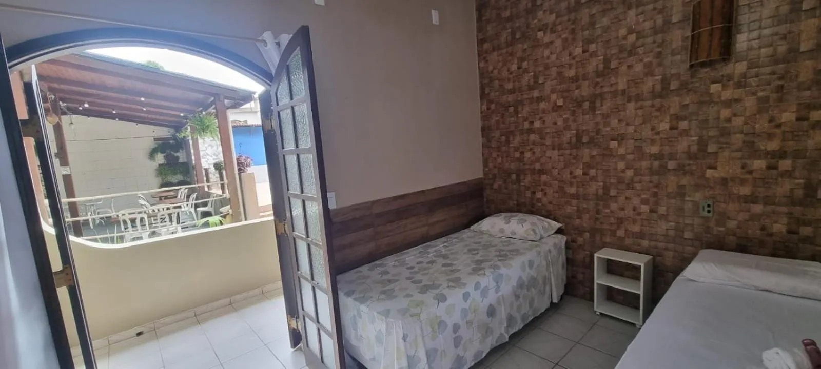 Bed in Pousada Boramar