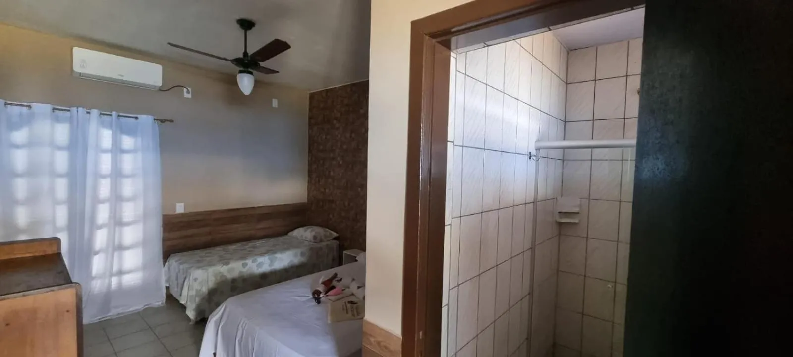 Bed in Pousada Boramar