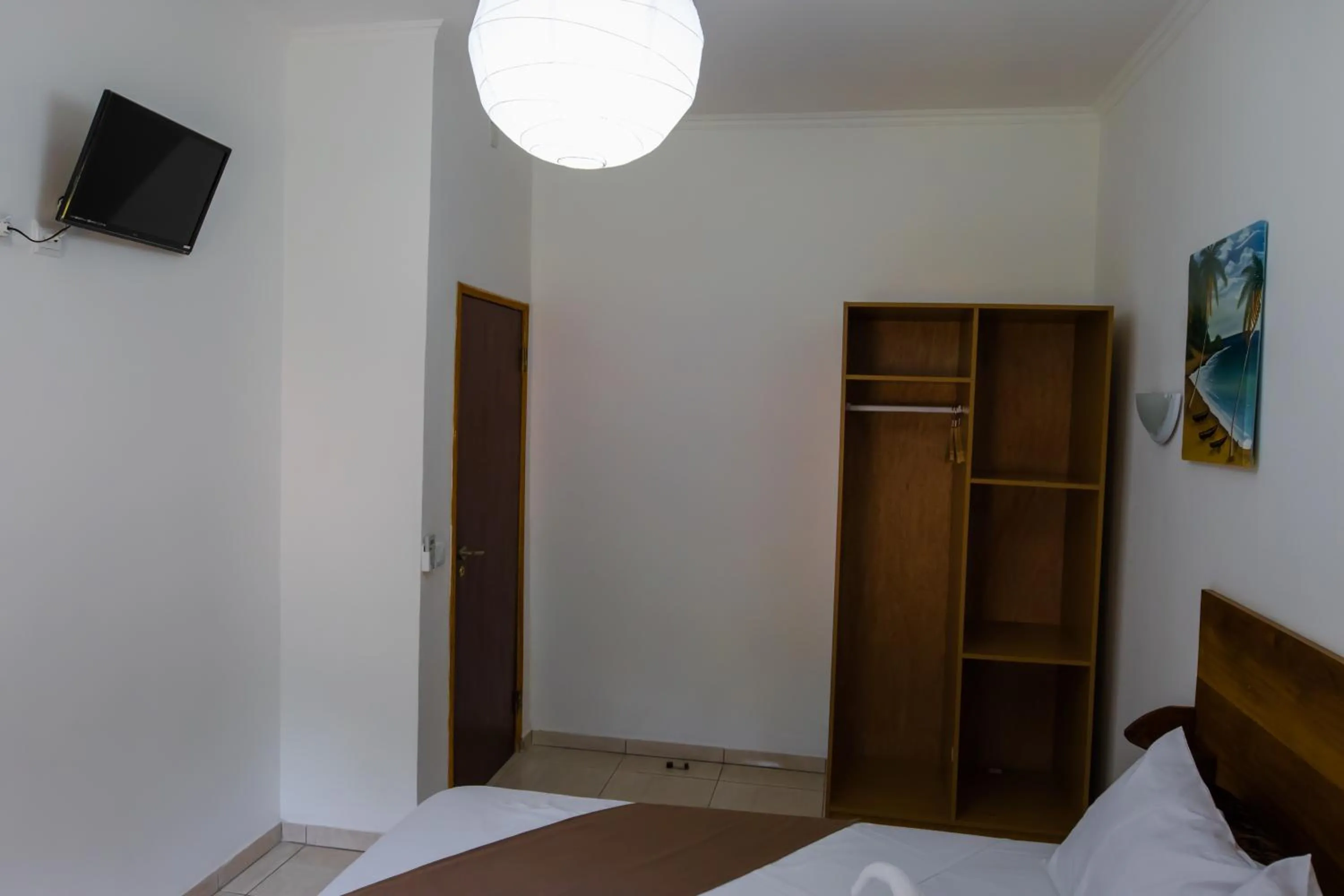 Photo of the whole room, Bed in Paradise Agua Leve Residential