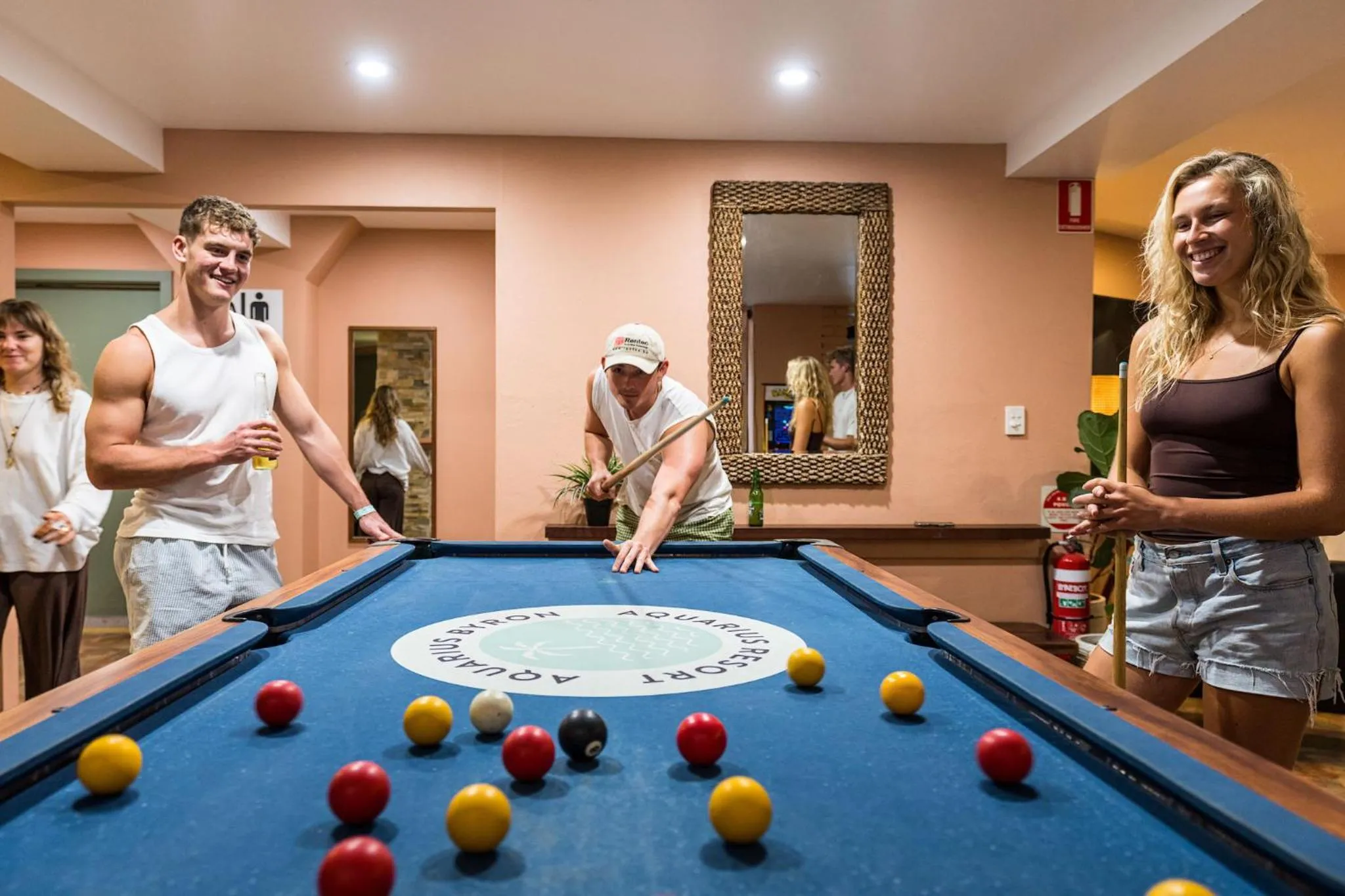 Communal lounge/ TV room in Aquarius Backpackers Resort