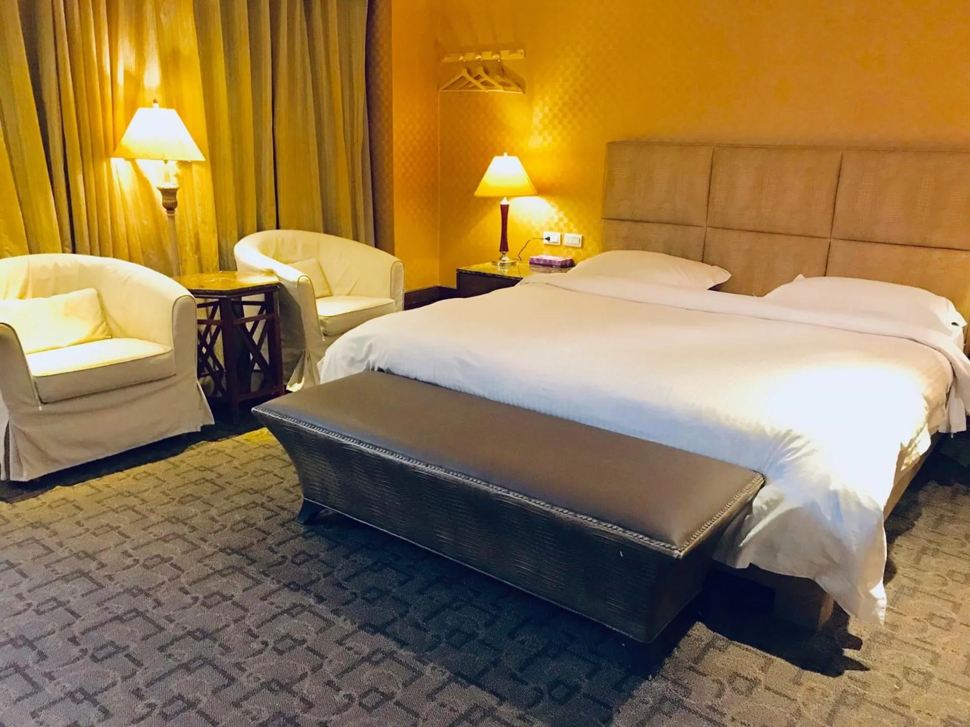 Bed in Kai Wei Boutique Hotel