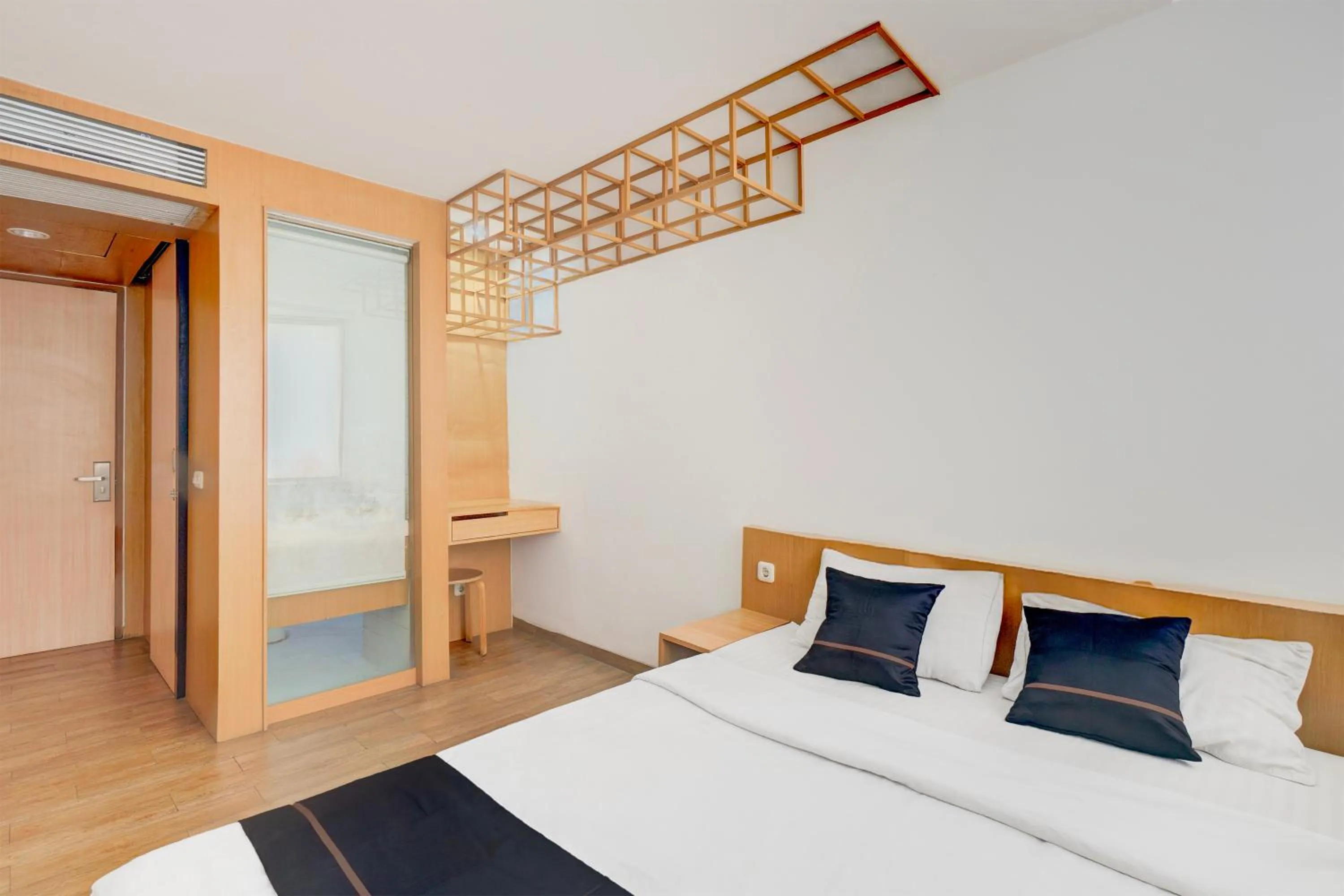 Photo of the whole room, Bed in Hotel O Pondok Indah Near Gandaria City Formerly Odori Residence