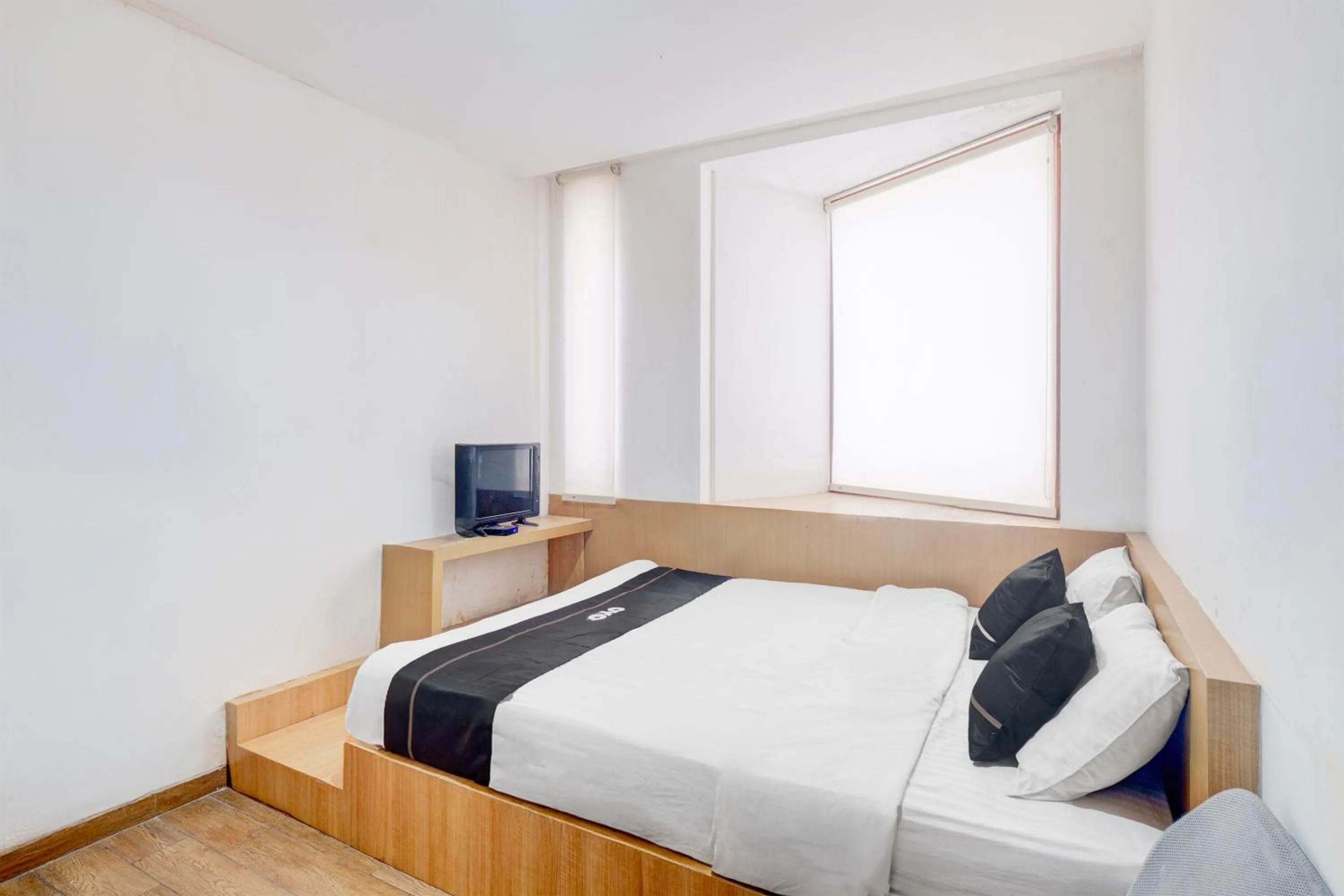 Photo of the whole room, Bed in Hotel O Pondok Indah Near Gandaria City Formerly Odori Residence