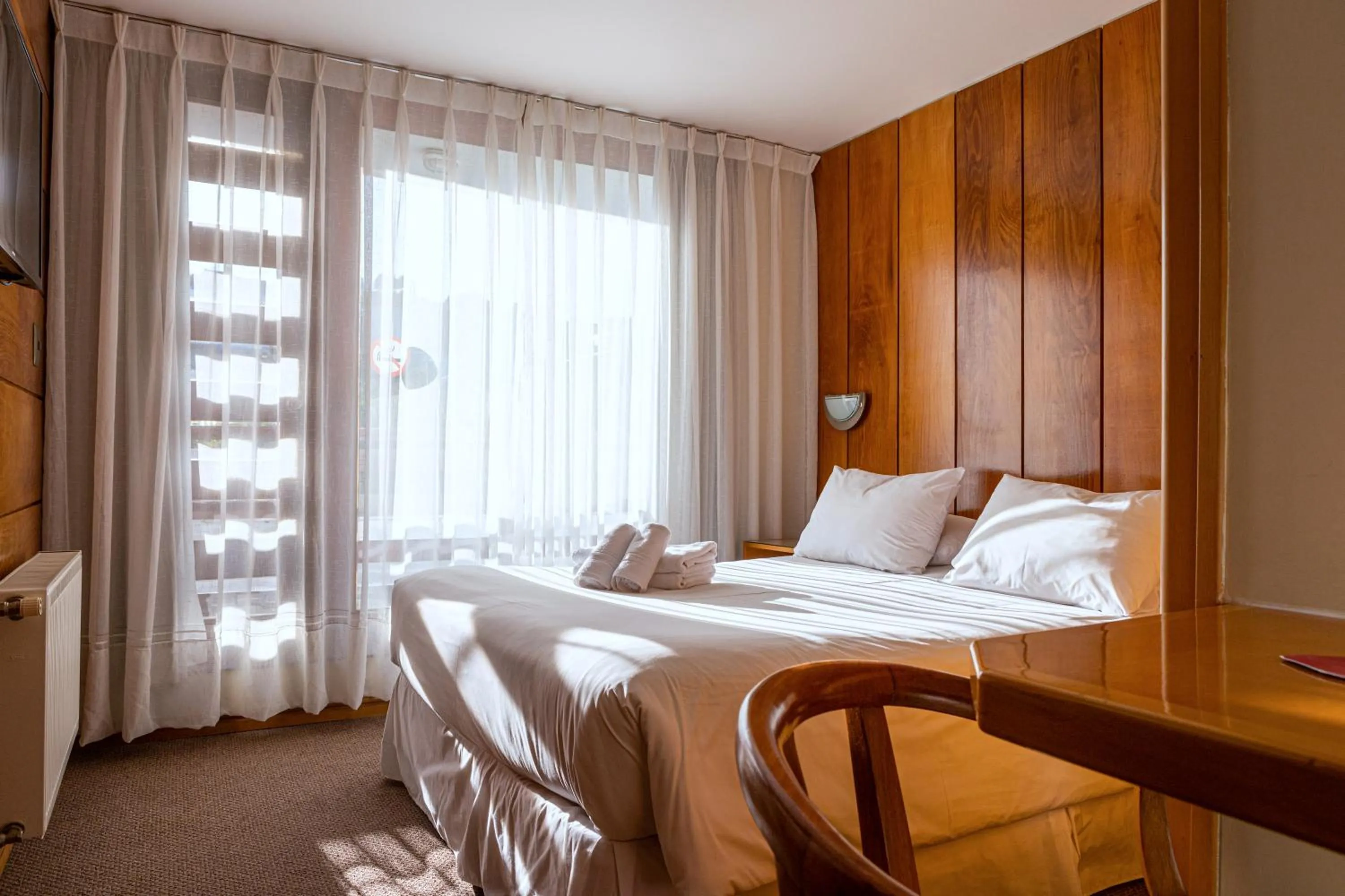 Bed in Hotel Germania