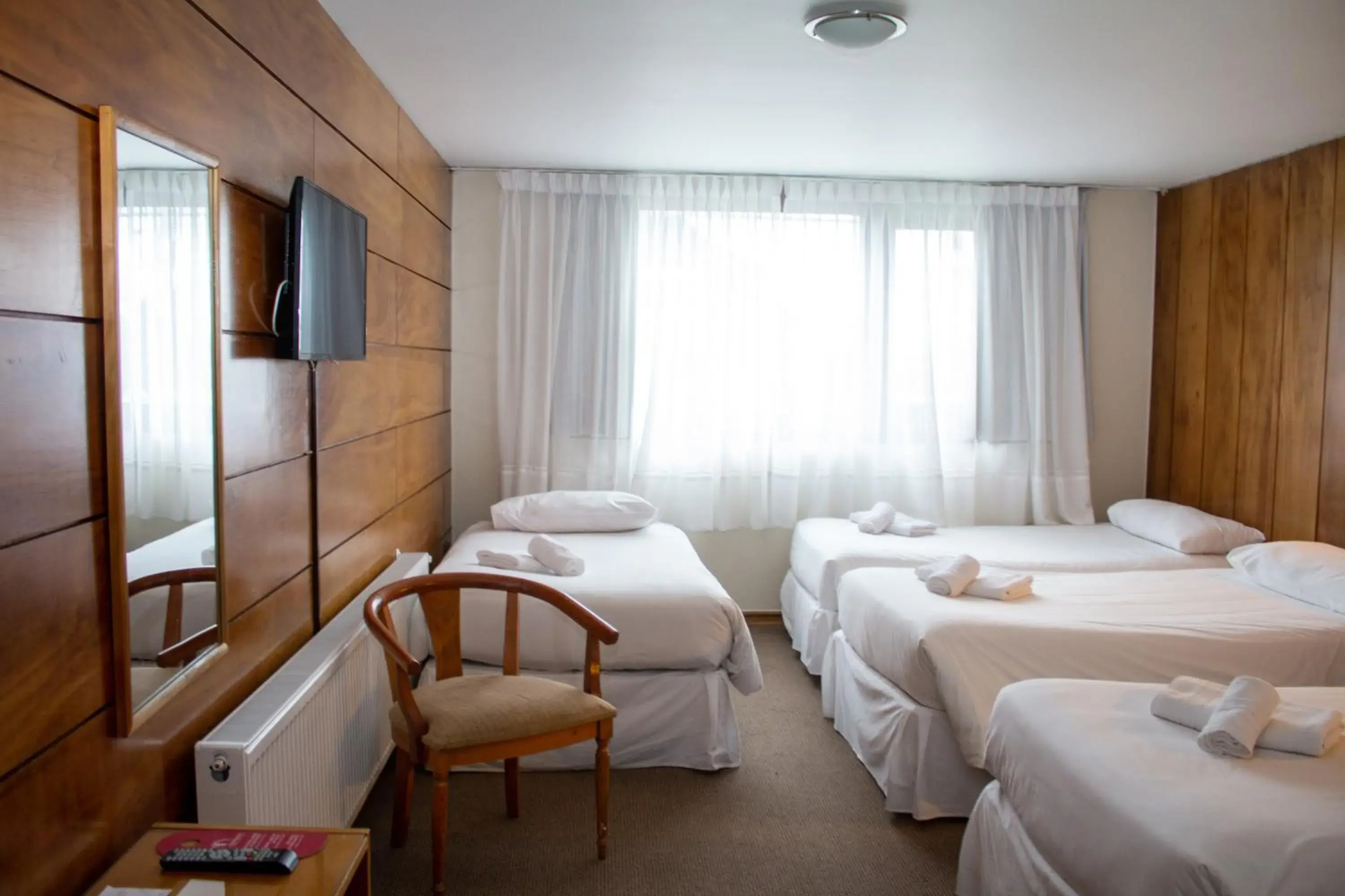Standard Quadruple Room in Hotel Germania Standard Quadruple Room in Hotel Germania