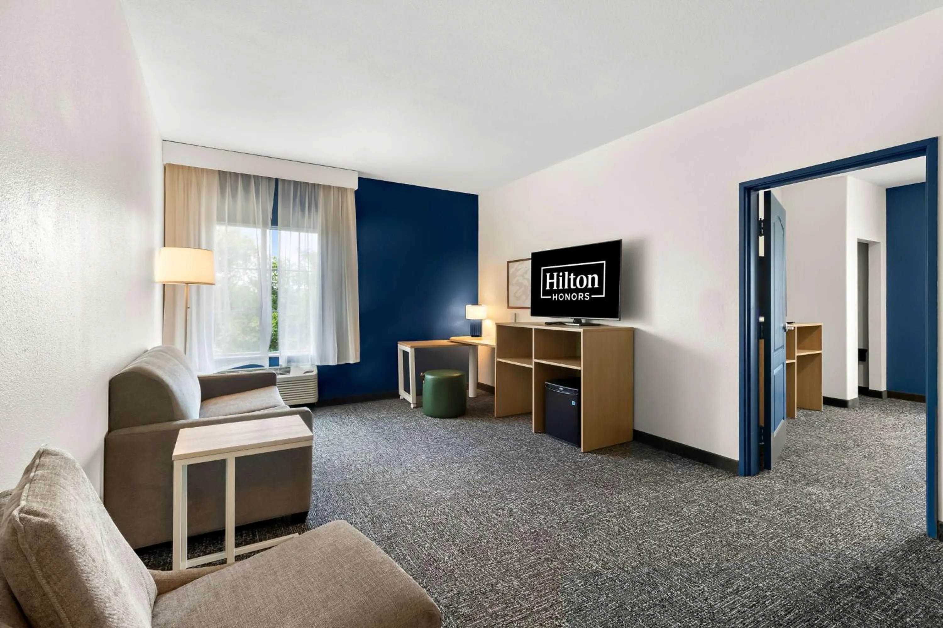 Living room in Spark By Hilton Missouri City