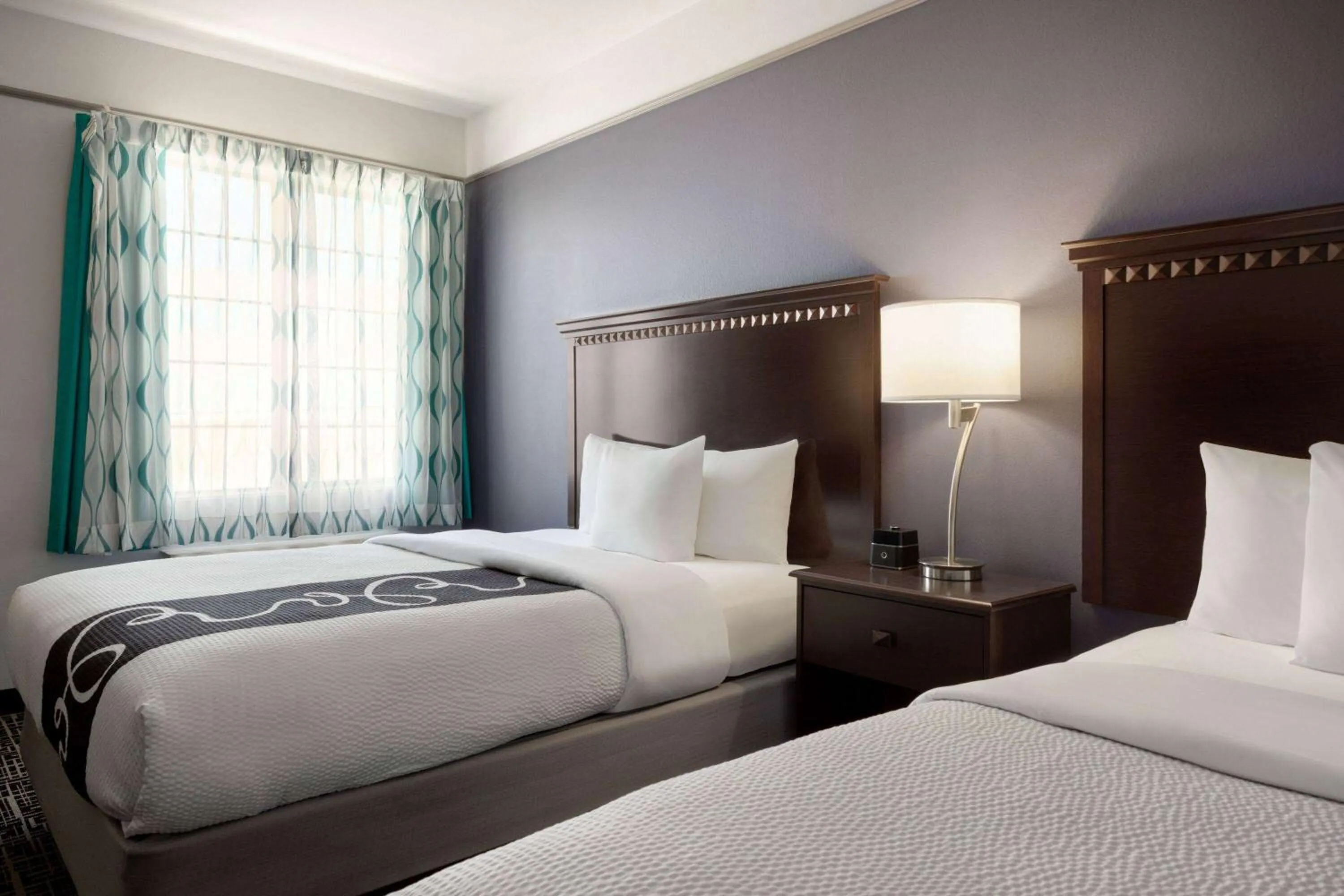 Photo of the whole room, Bed in La Quinta by Wyndham Dumas