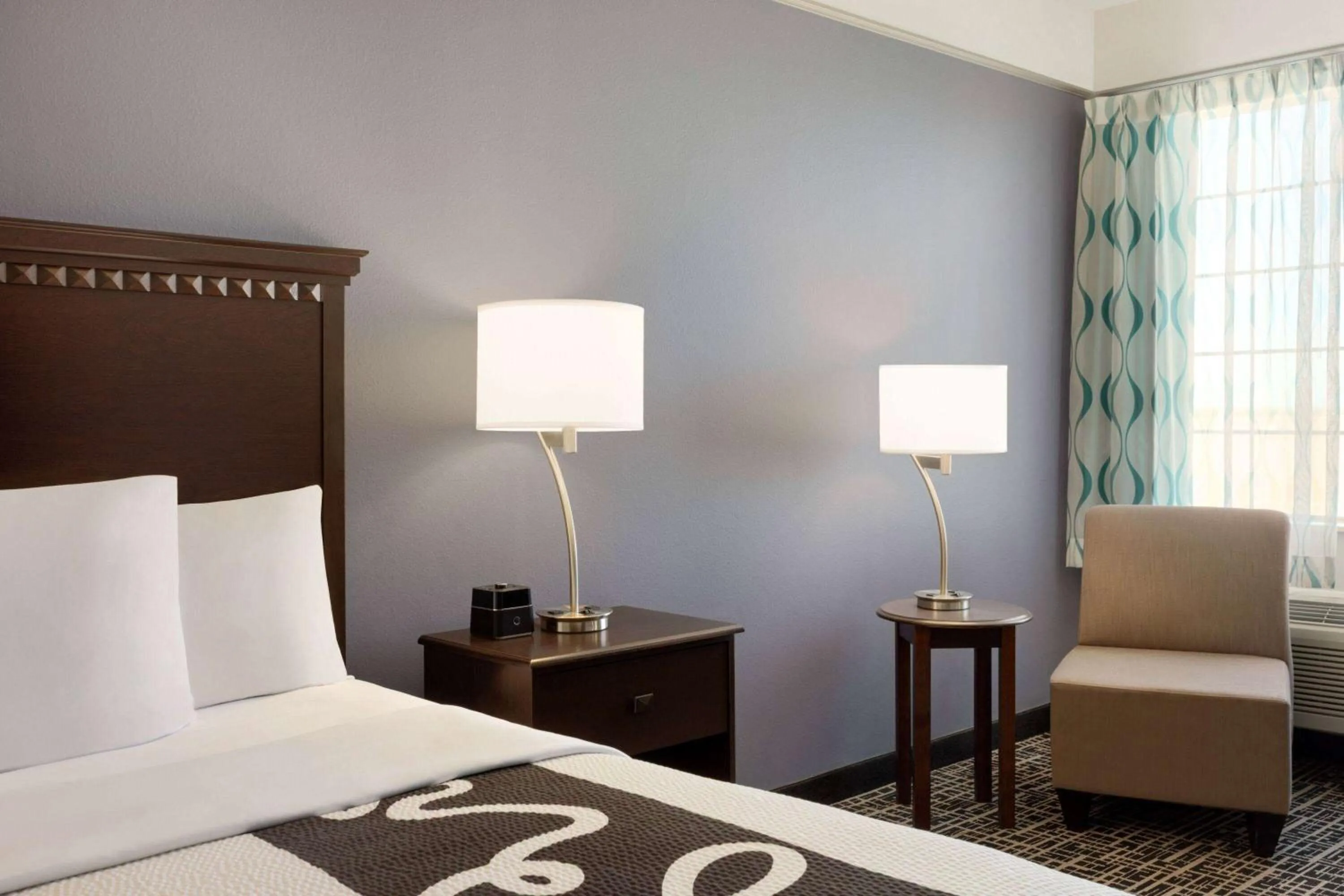 Photo of the whole room, Bed in La Quinta by Wyndham Dumas