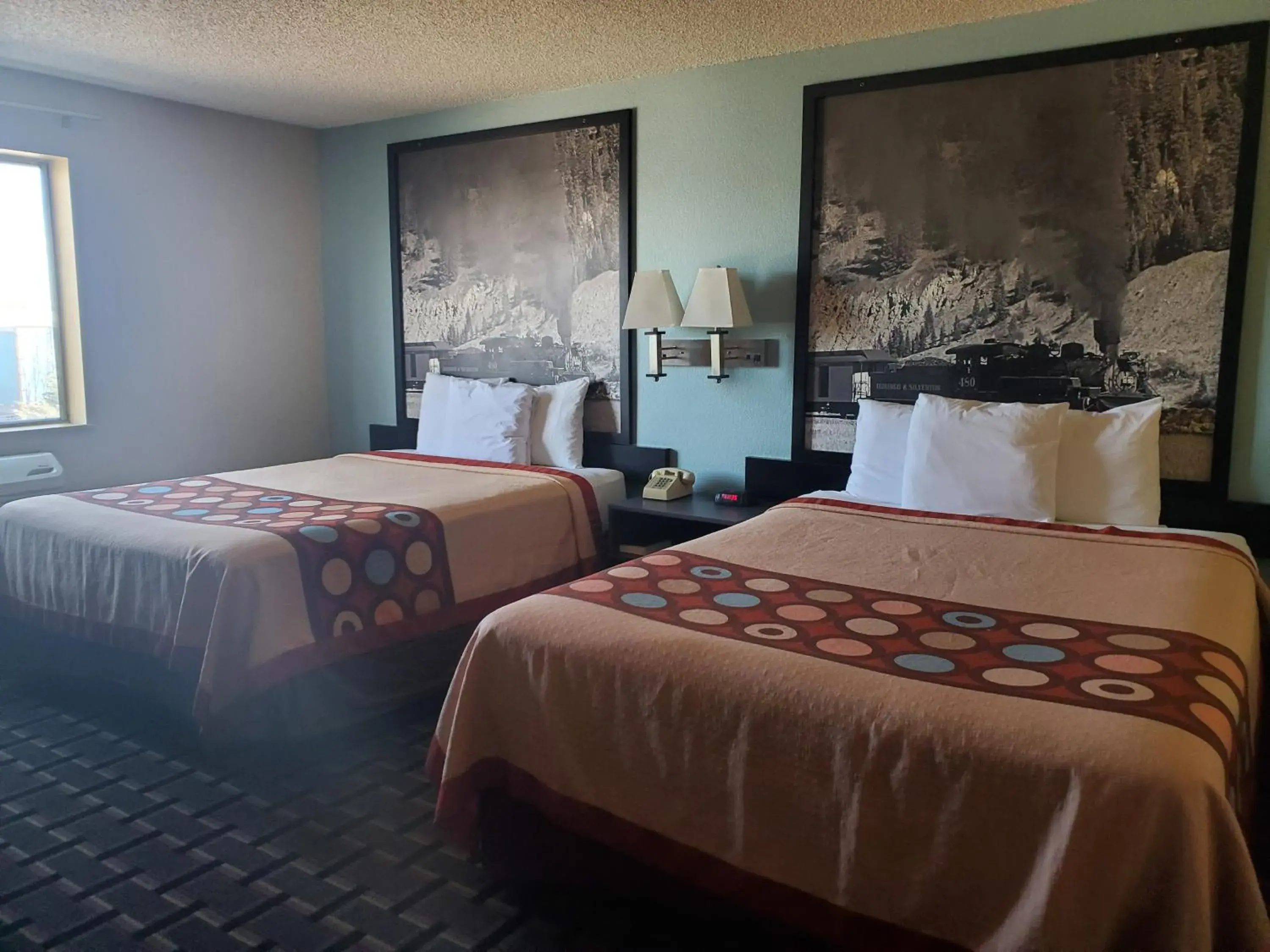 Photo of the whole room, Bed in Super 8 by Wyndham Henderson North East Denver