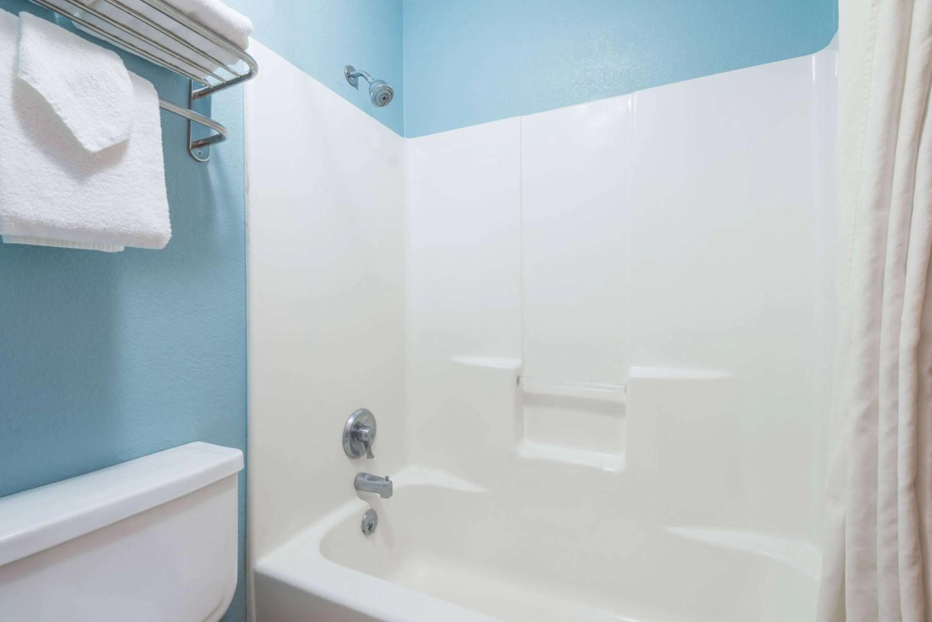 Bathroom in Super 8 by Wyndham Henderson North East Denver