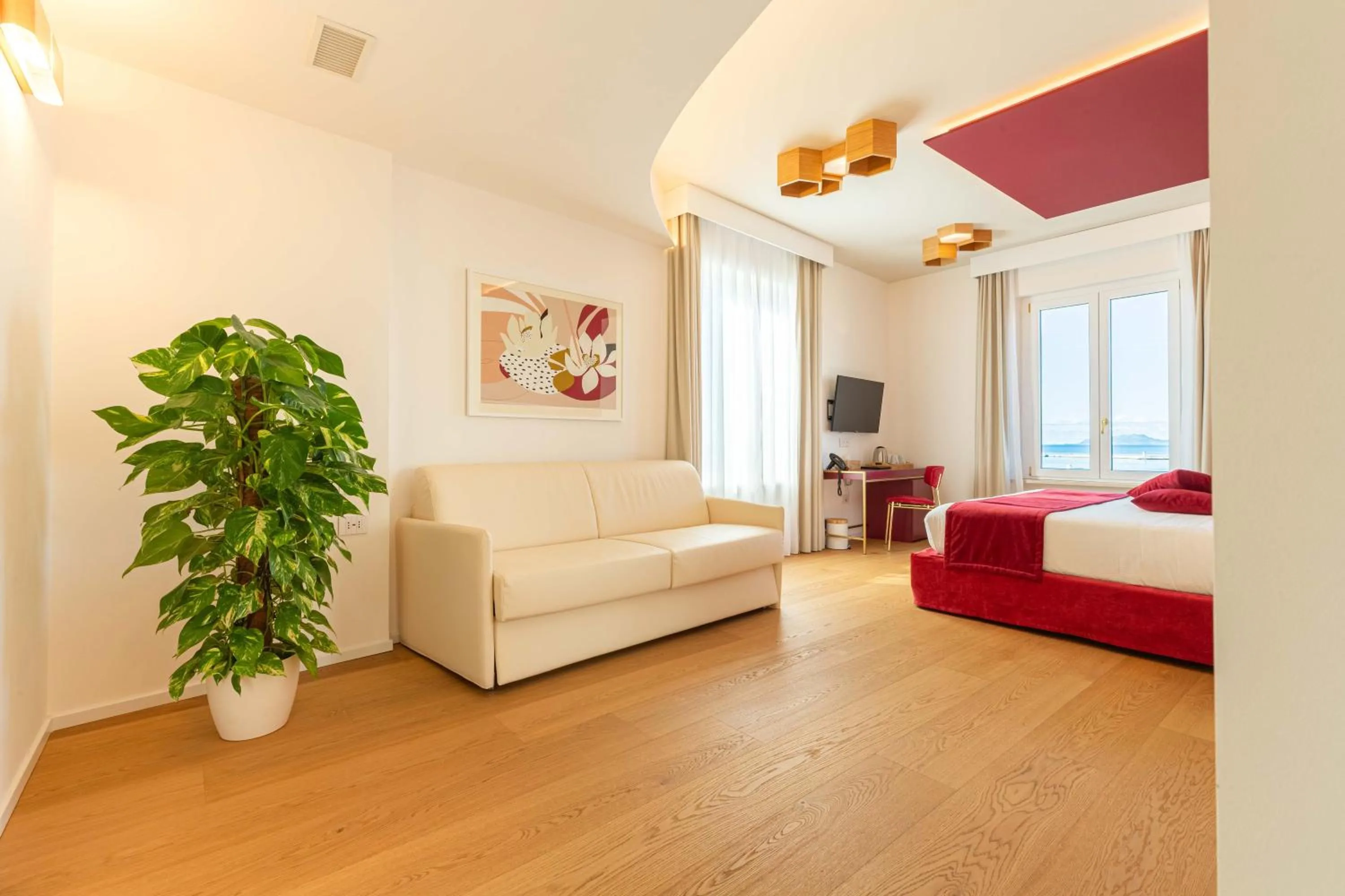 Living room, Bed in Hotel Aristeo