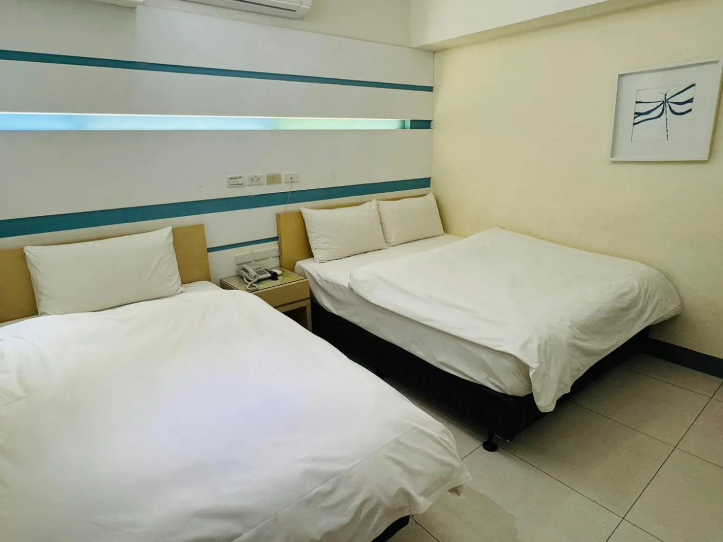 Photo of the whole room, Bed in Kiwi Express Hotel - Kaohsiung Station